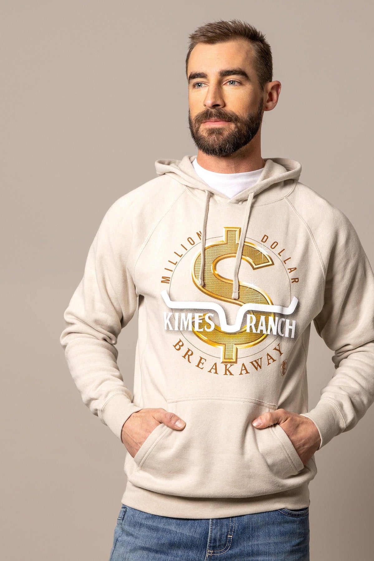 Kimes Ranch MDB Pullover hoodie in oatmeal with a gold dollar sign graphic and Kimes Ranch Breakaway logo
