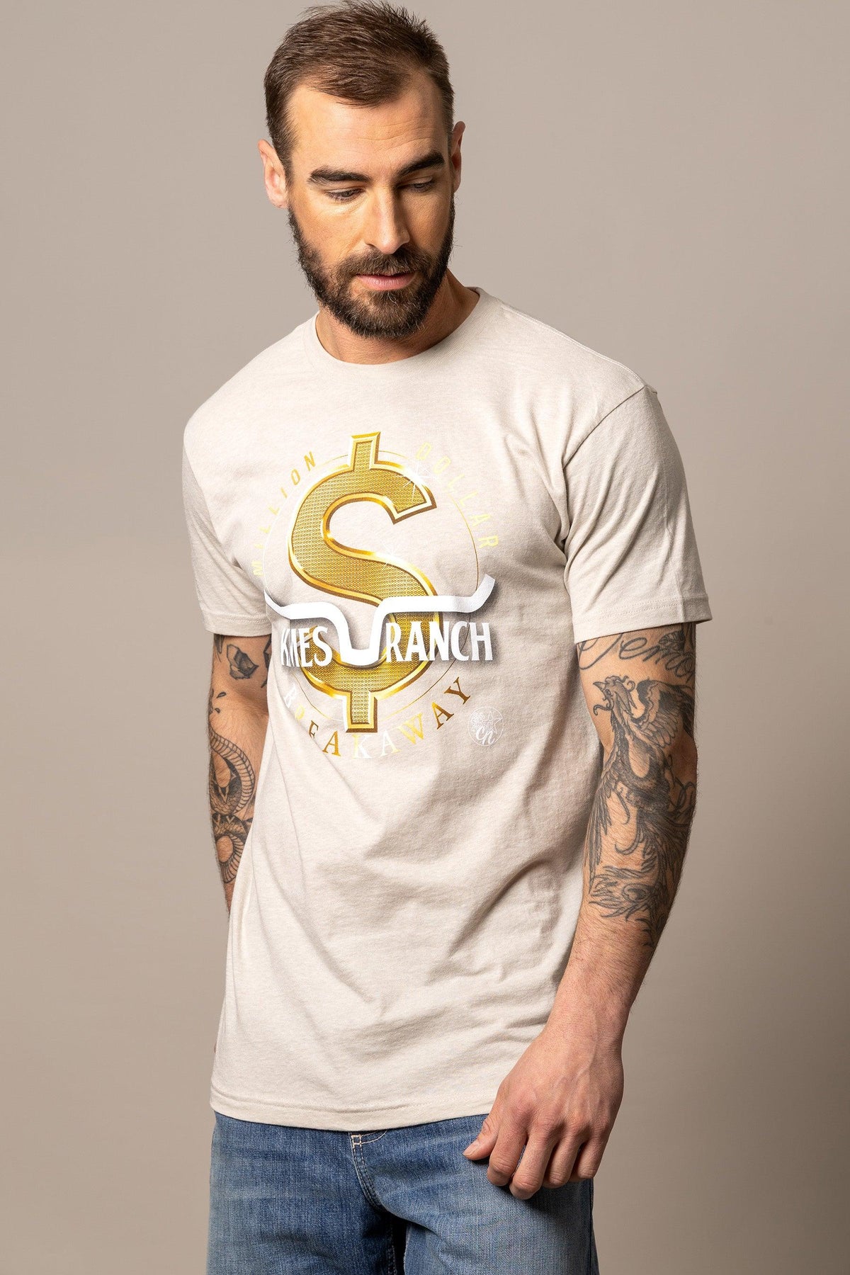 Kimes Ranch Men's MDB Tee in oatmeal with a gold dollar sign graphic and Kimes Ranch wordmark