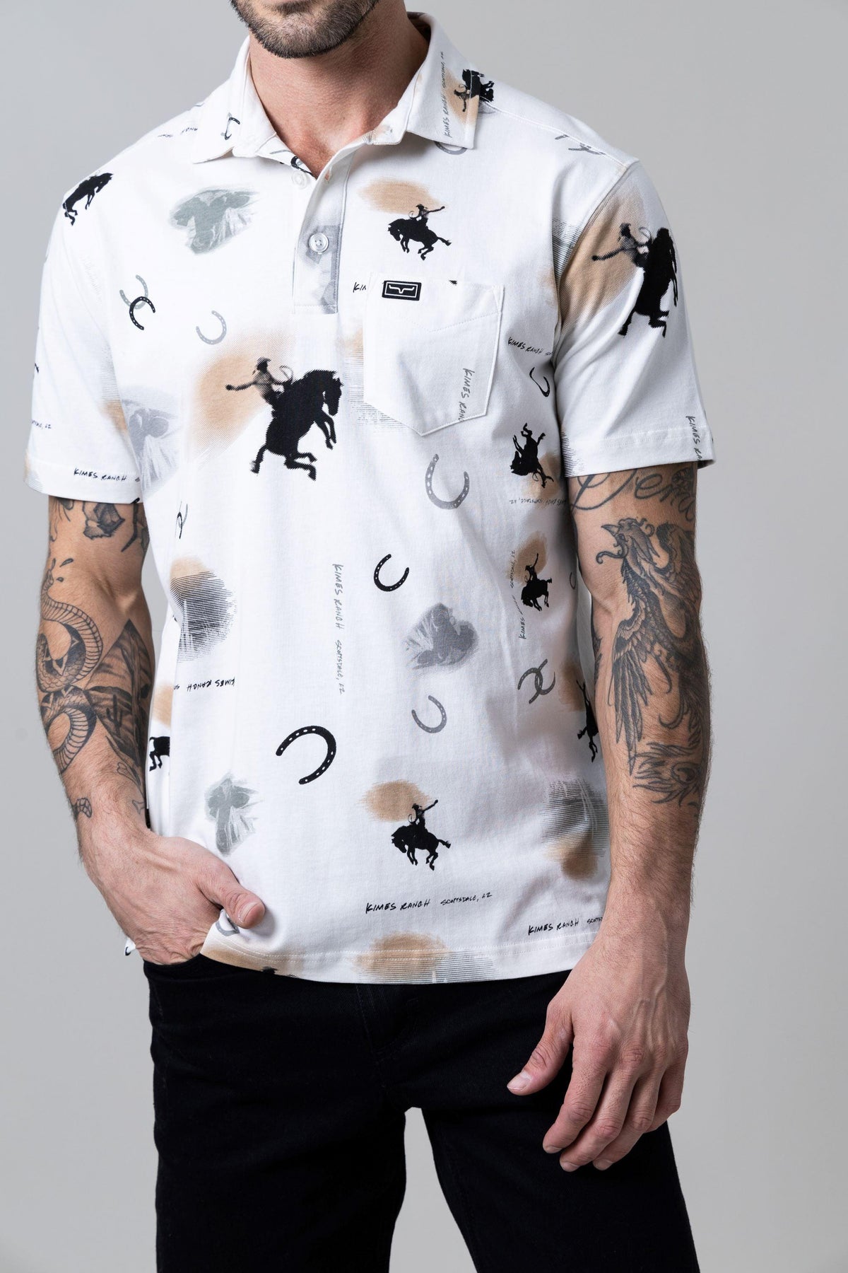 Kimes Ranch Bayard Polo in Light Grey with a western print of bucking broncos and horseshoes