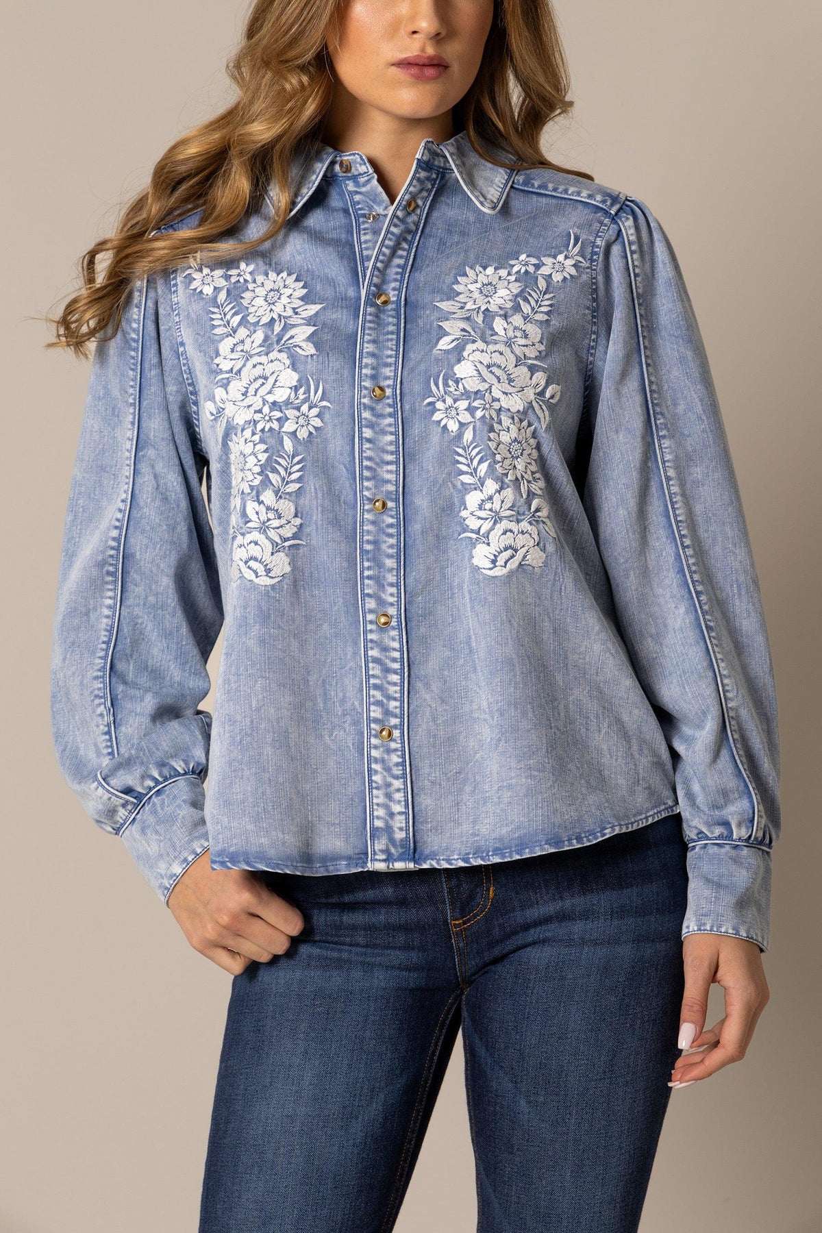 Kimes Ranch Mae top in Light Wash Indigo with white floral embroidery on the front