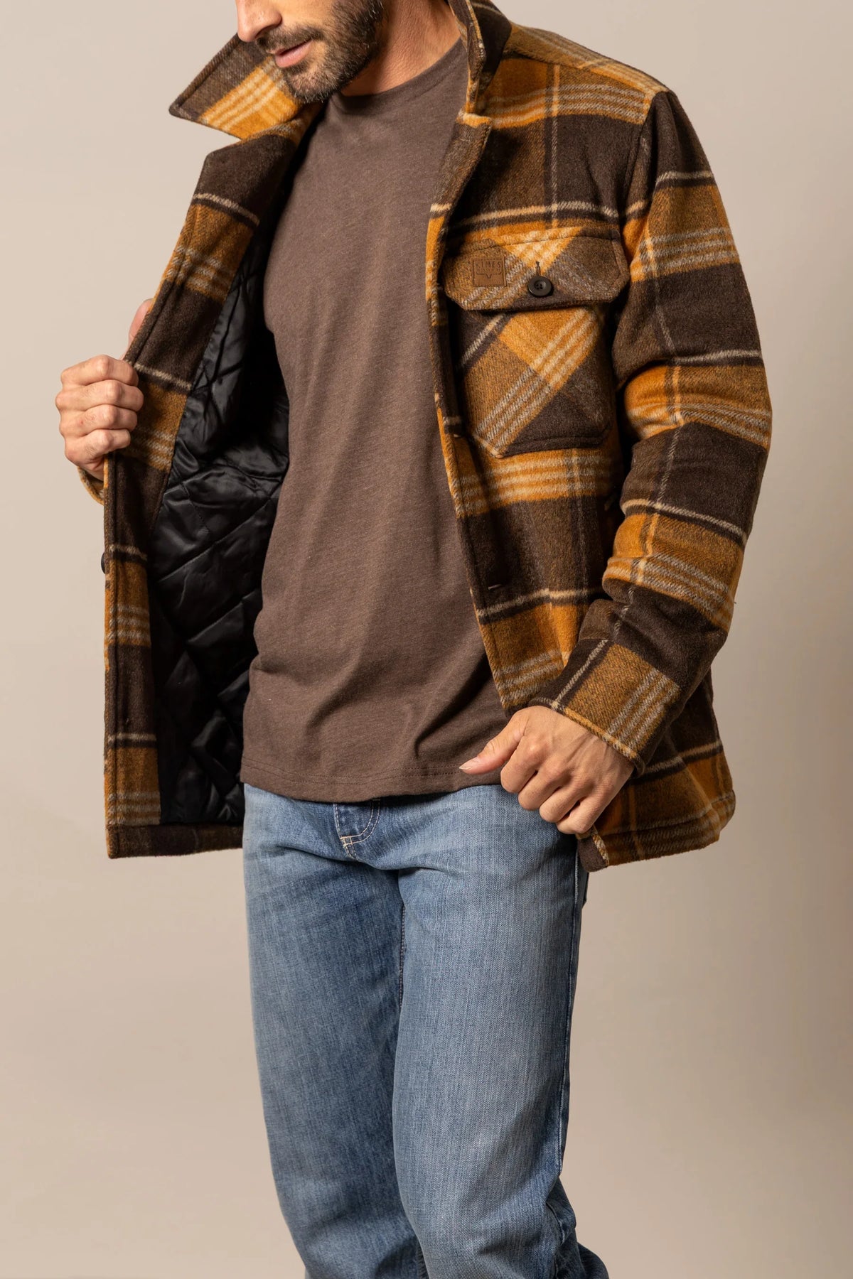 Kimes Ranch Marquette Wool Jacket in Brown with plaid pattern and quilted lining