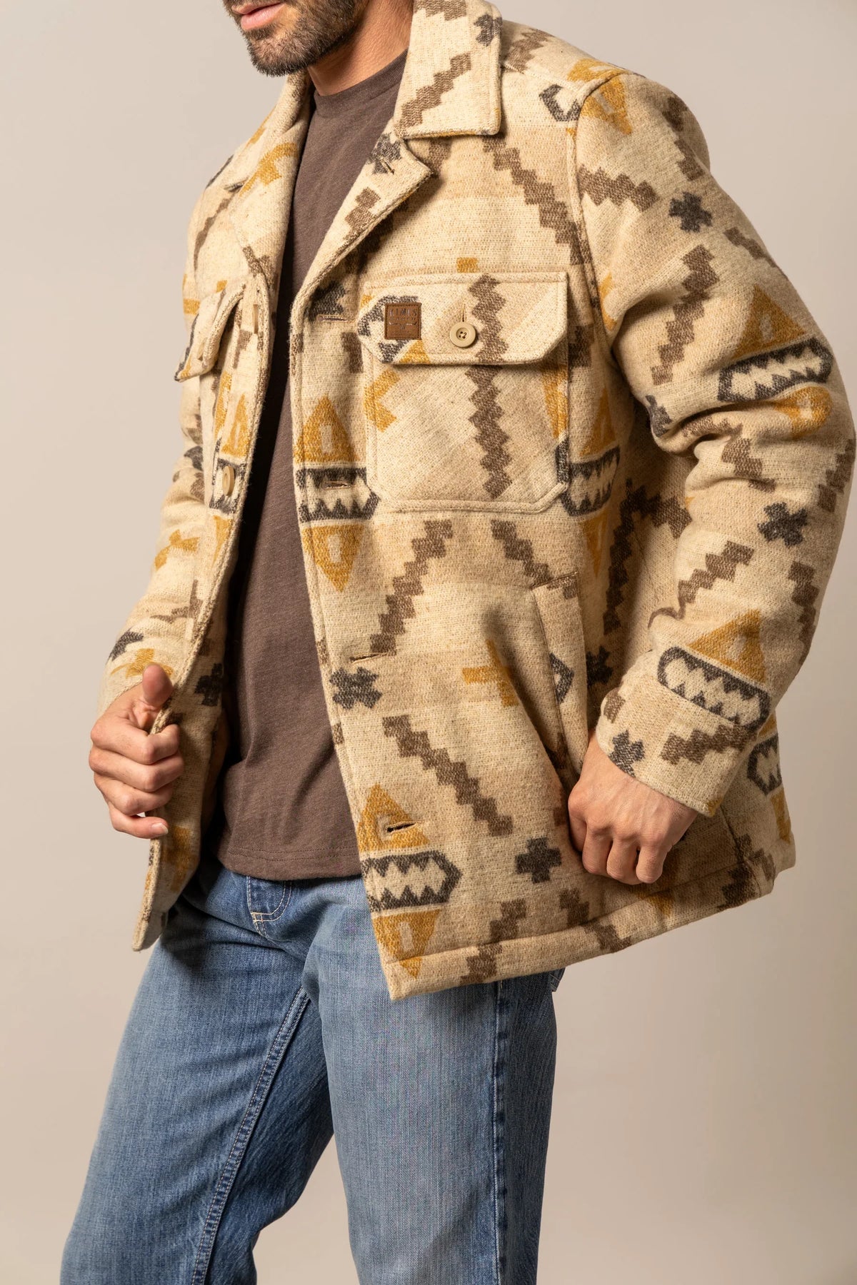 Kimes Ranch Marquette Wool Jacket in Tan with geometric pattern and button flap chest pocket