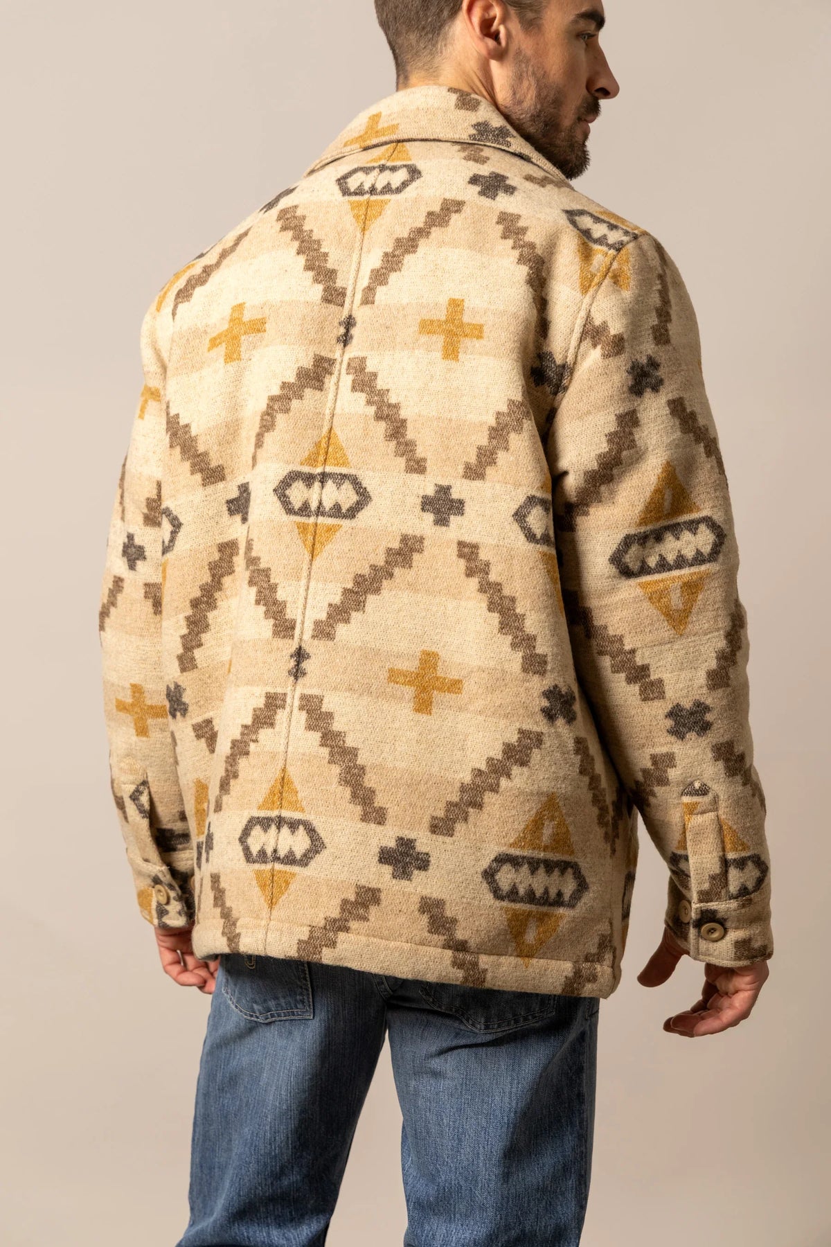 Kimes Ranch Marquette Wool Jacket in Tan, back view, with a geometric pattern of crosses and diamonds
