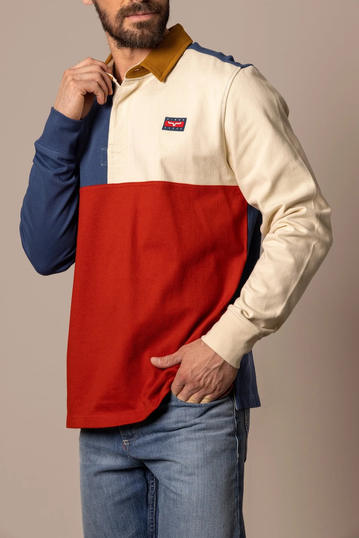 Kimes Ranch Marx Rugby polo in Dark Blue with cream and red color blocking and a mustard collar