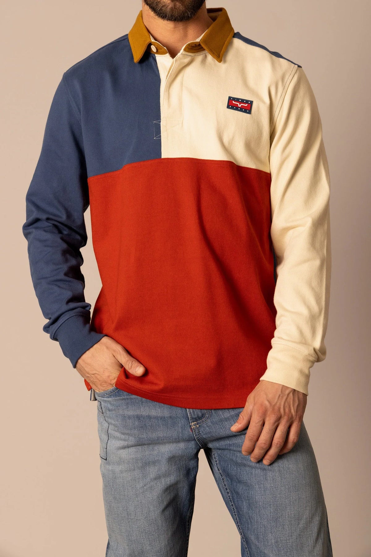 Kimes Ranch Marx Rugby polo in Dark Blue with colorblock red and cream panels and a mustard collar