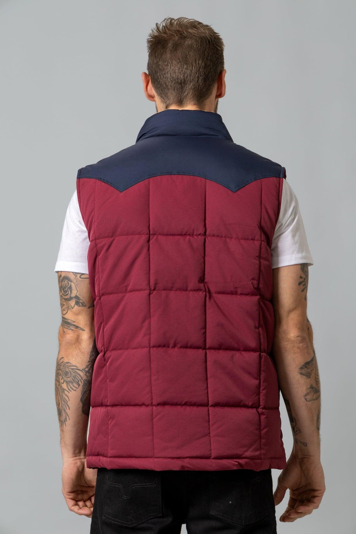 Kimes Ranch Muir Trail Vest in Burgundy, back view, with navy yoke and horizontal quilted stitching
