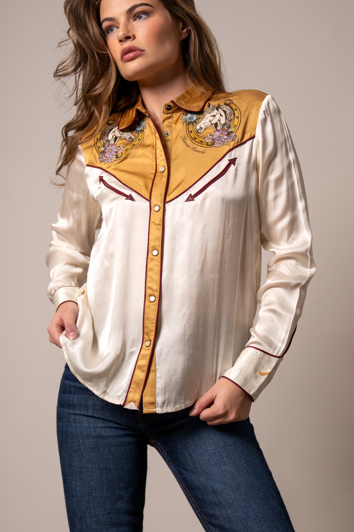 Kimes Ranch Merada top in Soft Gold with embroidered horse heads and floral details on the yoke