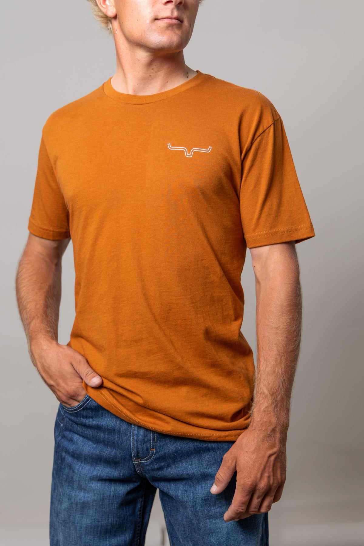 Kimes Ranch Mexicana Plate shirt in Clay with a white Kimes Ranch logo on the chest
