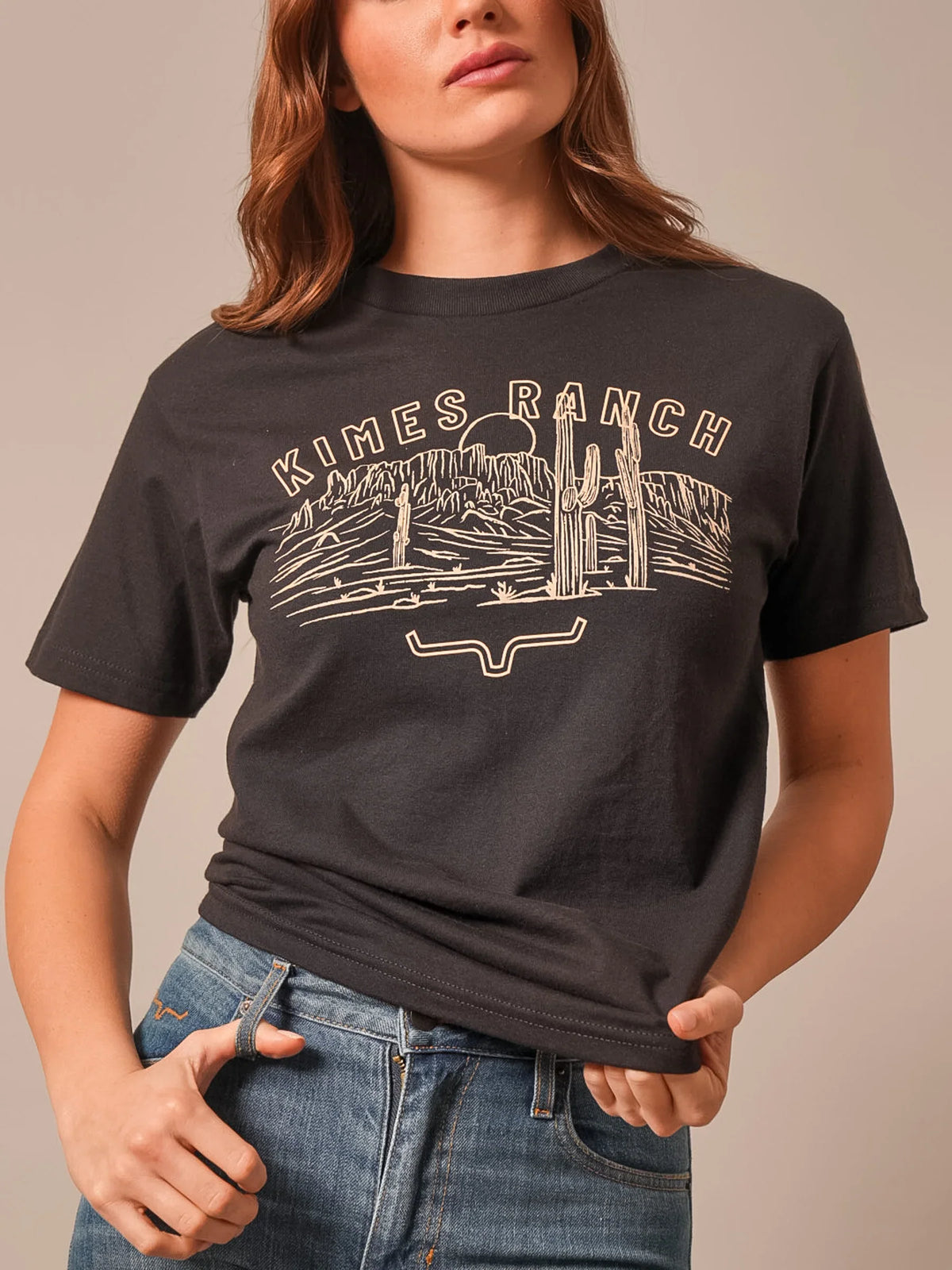 Kimes Ranch Mountain Badge shirt in Black with a desert landscape graphic and Kimes Ranch logo
