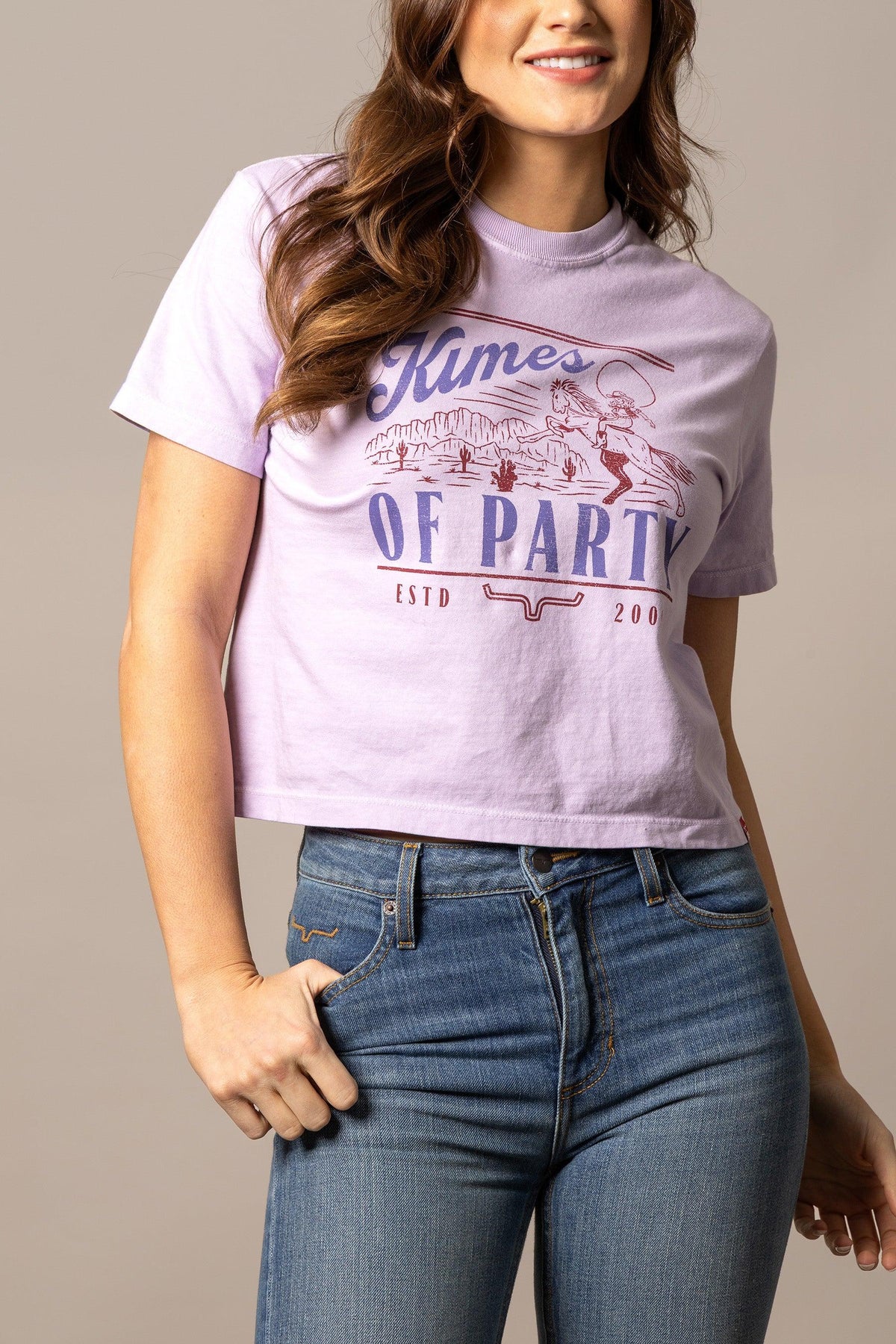 Kimes Ranch My Kimes of Party shirt in Orchid with a graphic of a cowboy on a horse and text reading Kimes OF PARTY ESTD 200