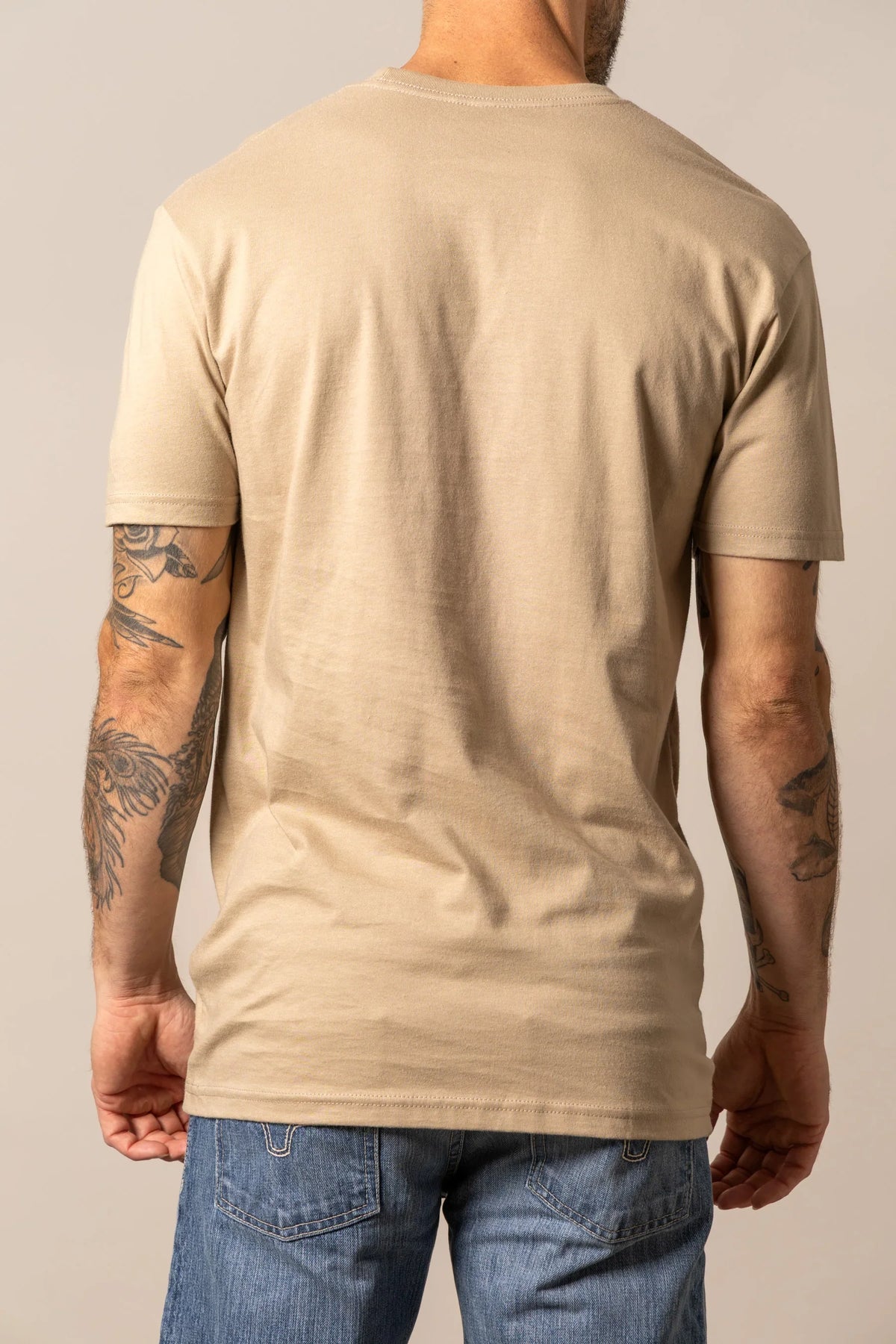 Kimes Ranch Night Call shirt in Tan, back view, with short sleeves and a crew neckline