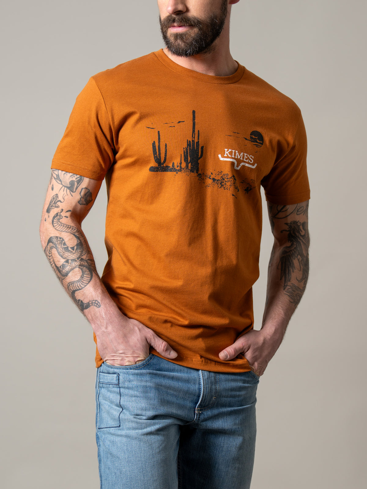 Kimes Ranch Night Fall shirt in Clay with a desert cactus graphic and Kimes Ranch logo