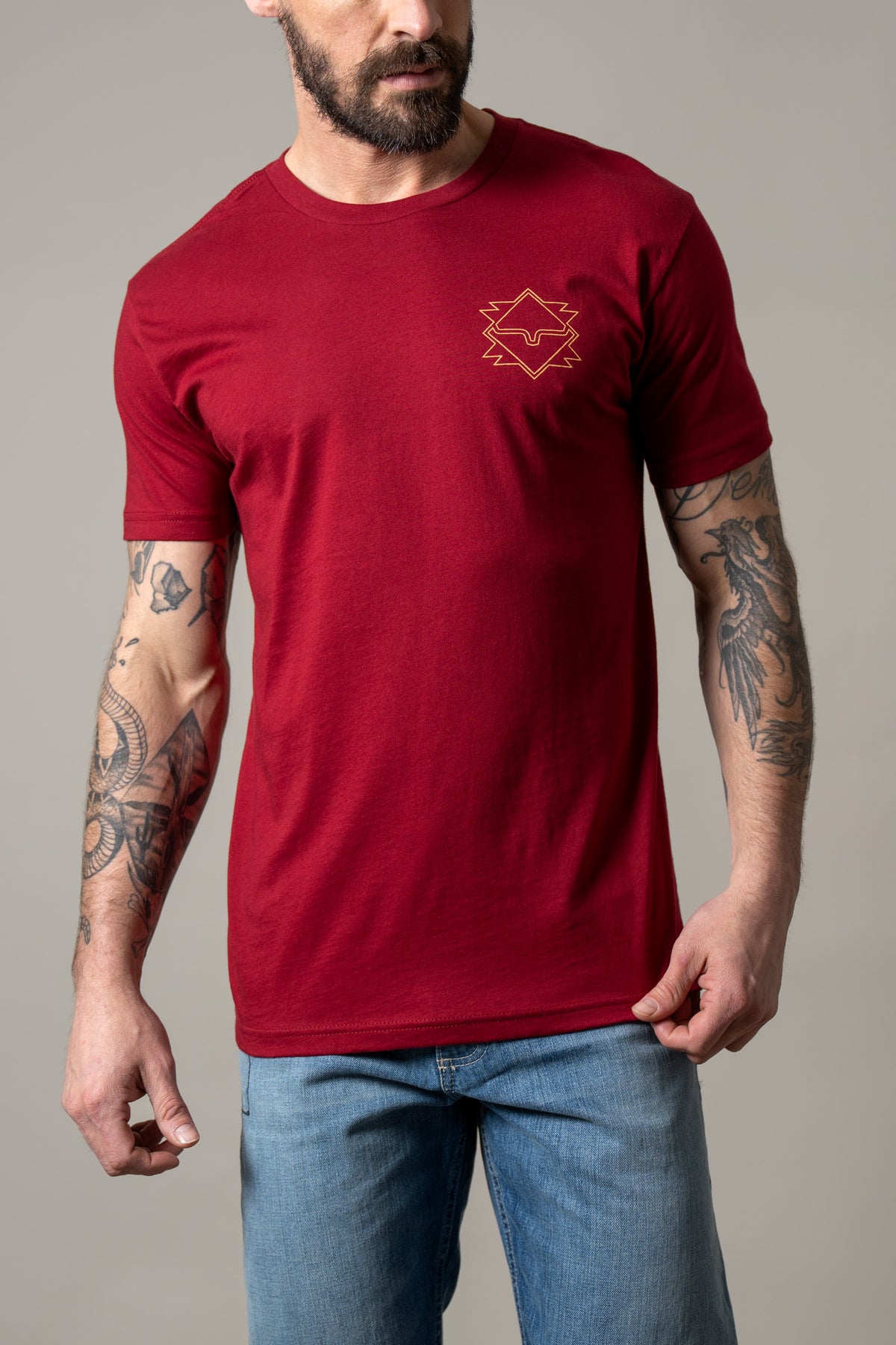 Kimes Ranch North Star short sleeve shirt in Cardinal with a gold embroidered logo on the chest