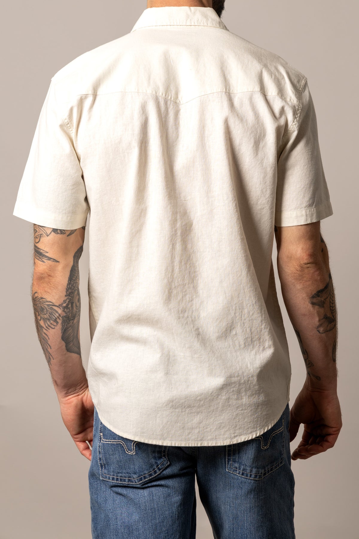 Kimes Ranch Nuce dress shirt in Stone, back view, with a back yoke and short sleeves