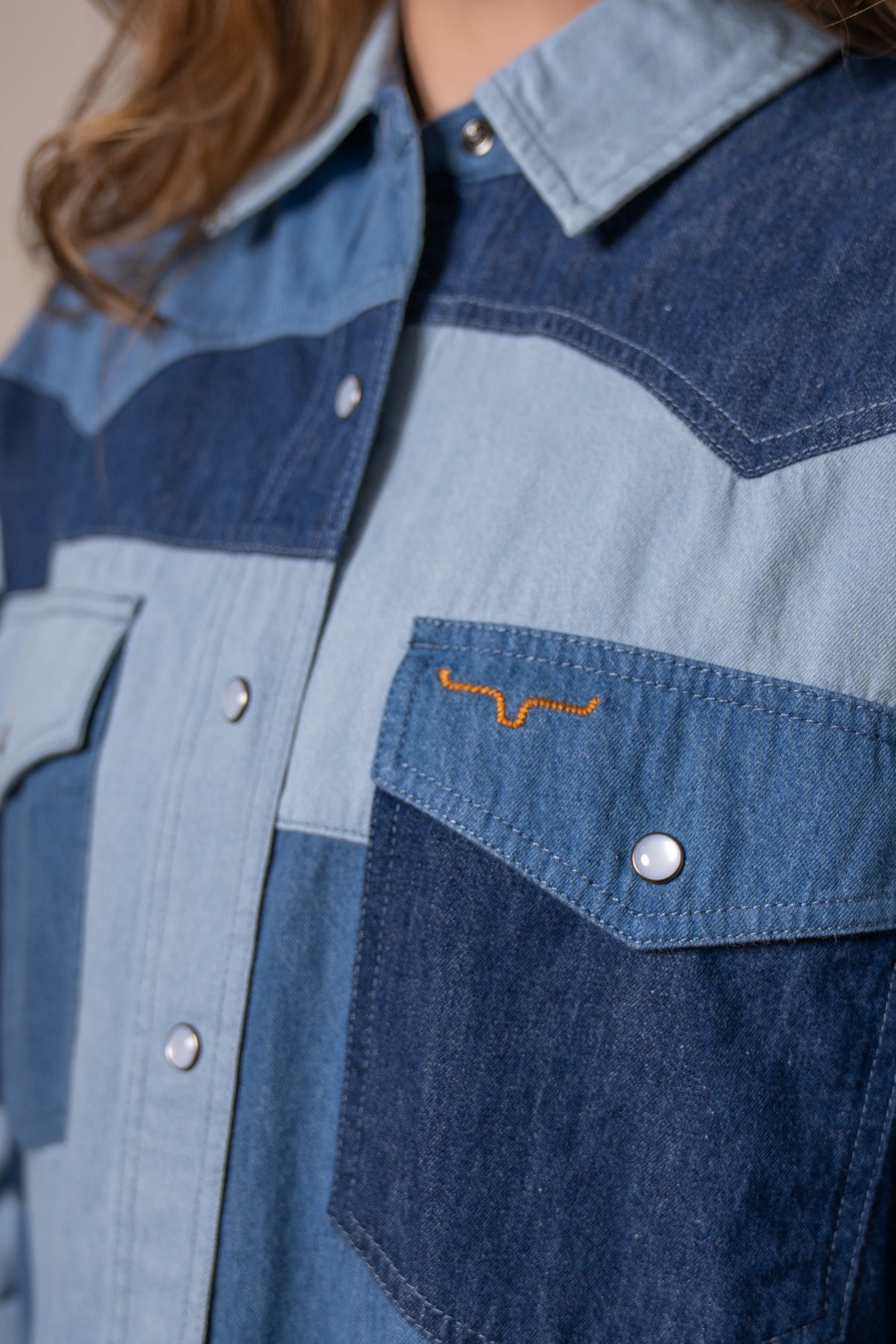 Kimes Ranch Olly jacket in Indigo, close-up, with colorblock and embroidered Kimes Ranch logo on the chest pocket