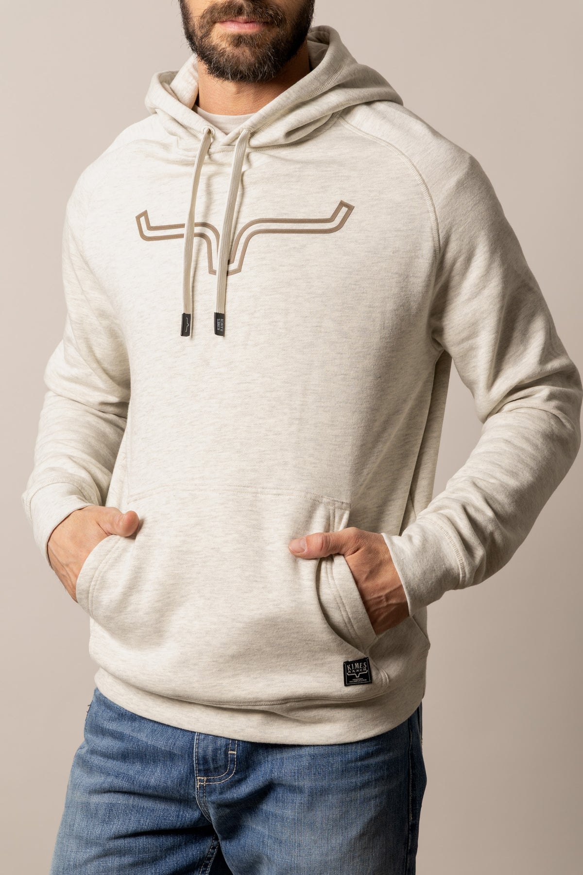 Kimes Ranch Outlier Hoodie in Natural Heather with a longhorn logo on the chest and a front kangaroo pocket