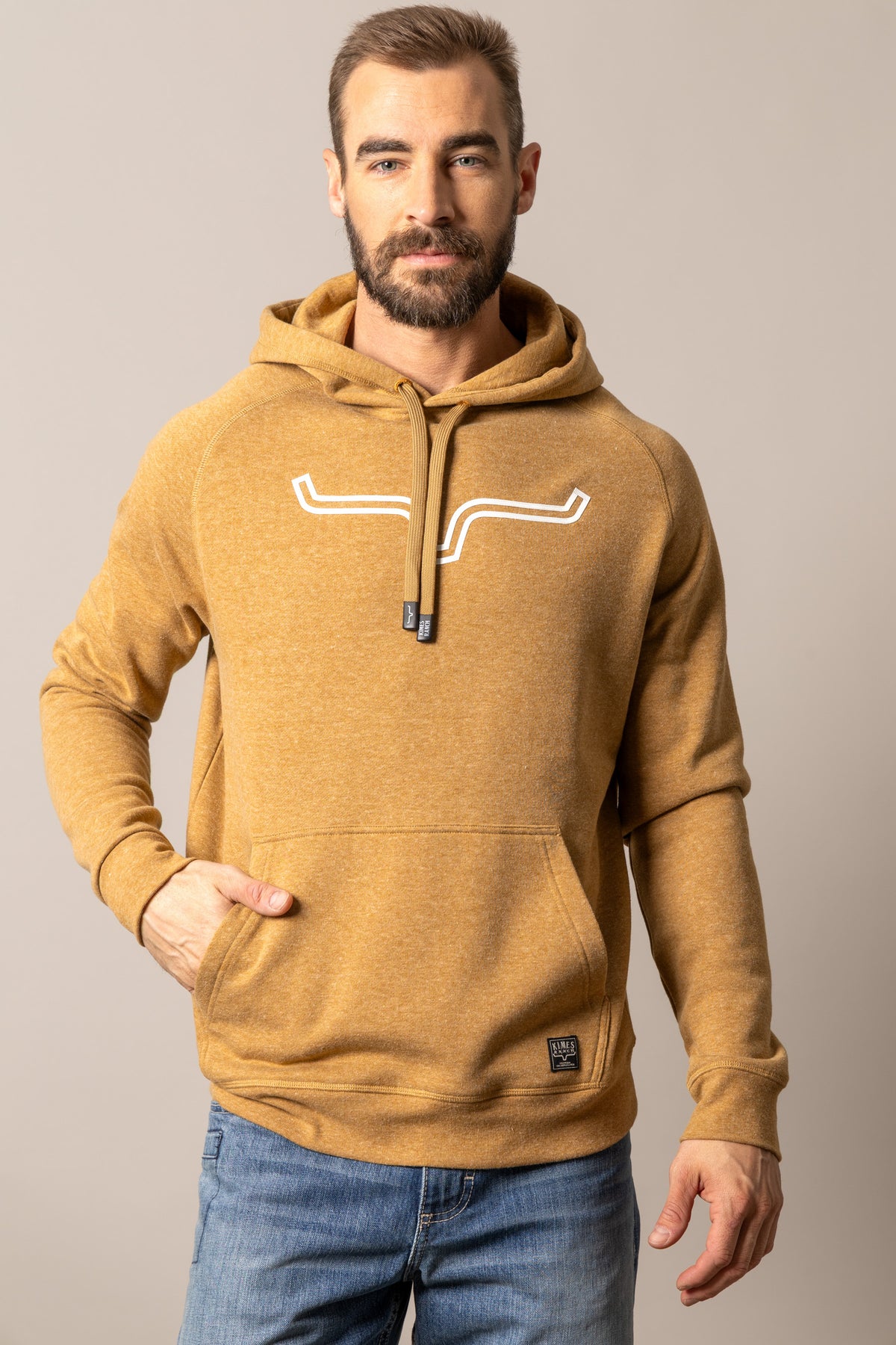 Kimes Ranch Outlier Hoodie in Rust Heather with a white longhorn logo and front kangaroo pocket
