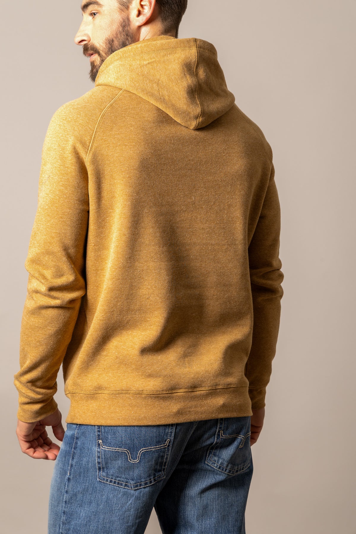 Kimes Ranch Outlier Hoodie in Rust Heather, back view, with a back yoke and long sleeves