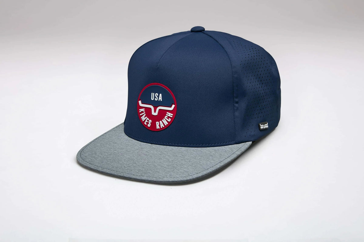 Kimes Ranch Palma hat in Blue, side view, with a grey brim and a red and white USA logo on the front