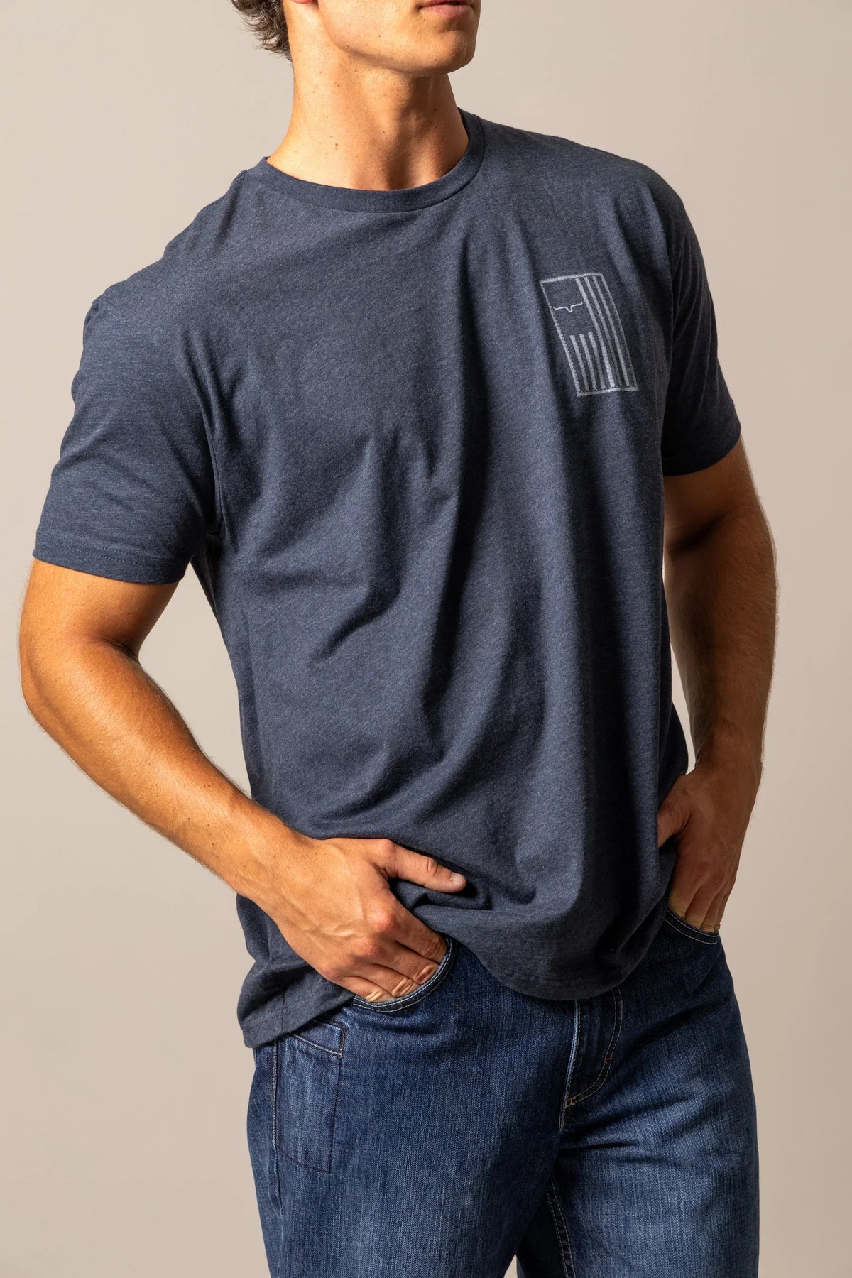 Kimes Ranch Patched shirt in Midnight Navy with a Kimes Ranch logo graphic on the chest