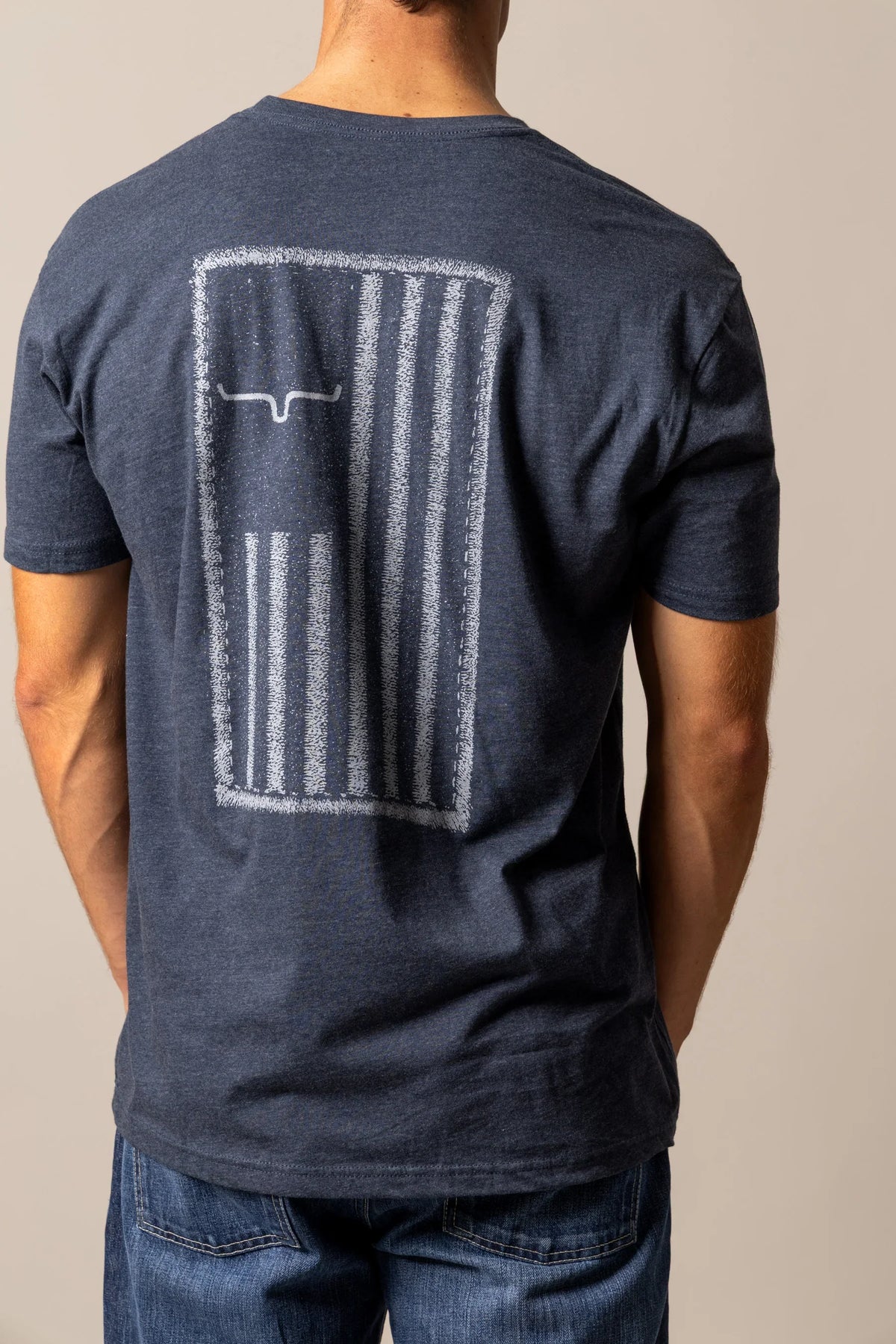 Kimes Ranch Patched shirt in Midnight Navy, back view, with distressed flag graphic featuring the Kimes Ranch logo
