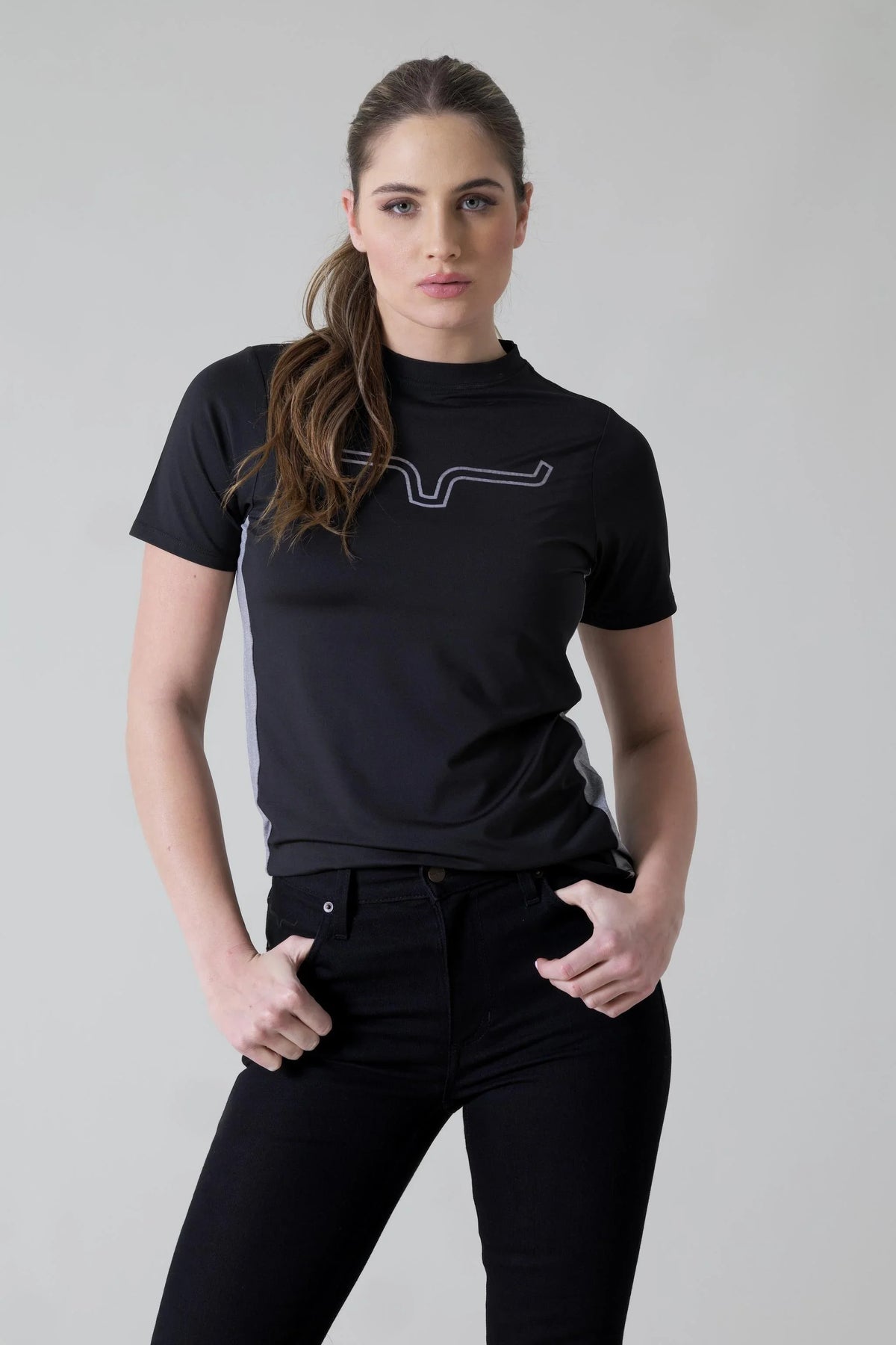 Kimes Ranch Ladies Phase 2 Tech Shirt in Black with a white logo and grey side panels