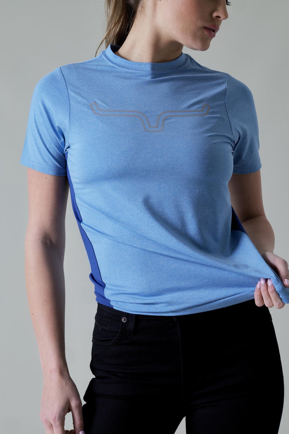 Kimes Ranch Ladies Phase 2 Tech Shirt in Turq Heather with short sleeves and a tonal logo on the chest; #color_turq heather