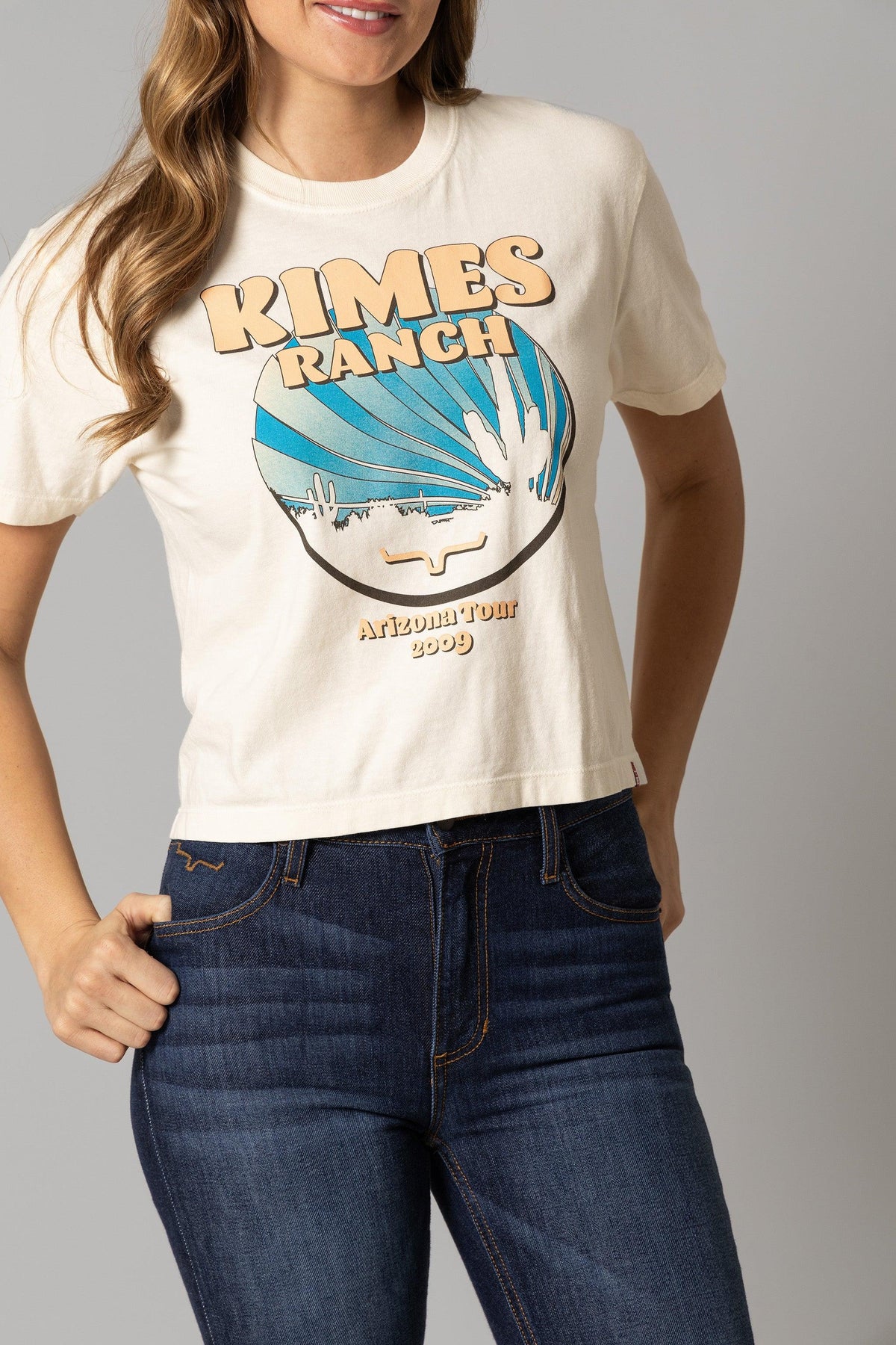 Kimes Ranch Psyche Tour shirt in Ivory with a graphic of a blue sunburst and Arizona Tour 2009 text
