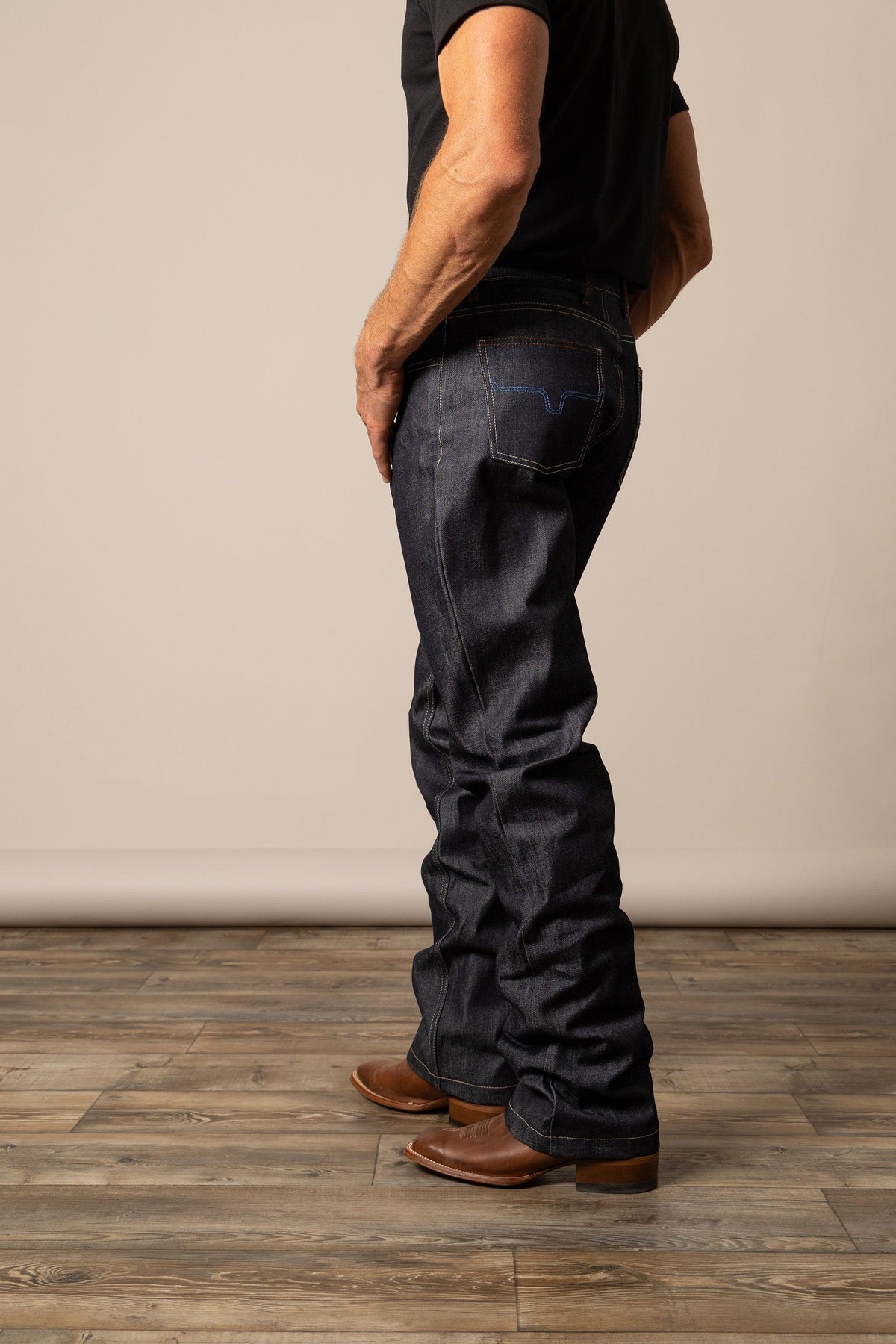 Kimes Ranch Raw Dillon relaxed bootcut jeans in dark indigo with contrast stitching and a back pocket detail