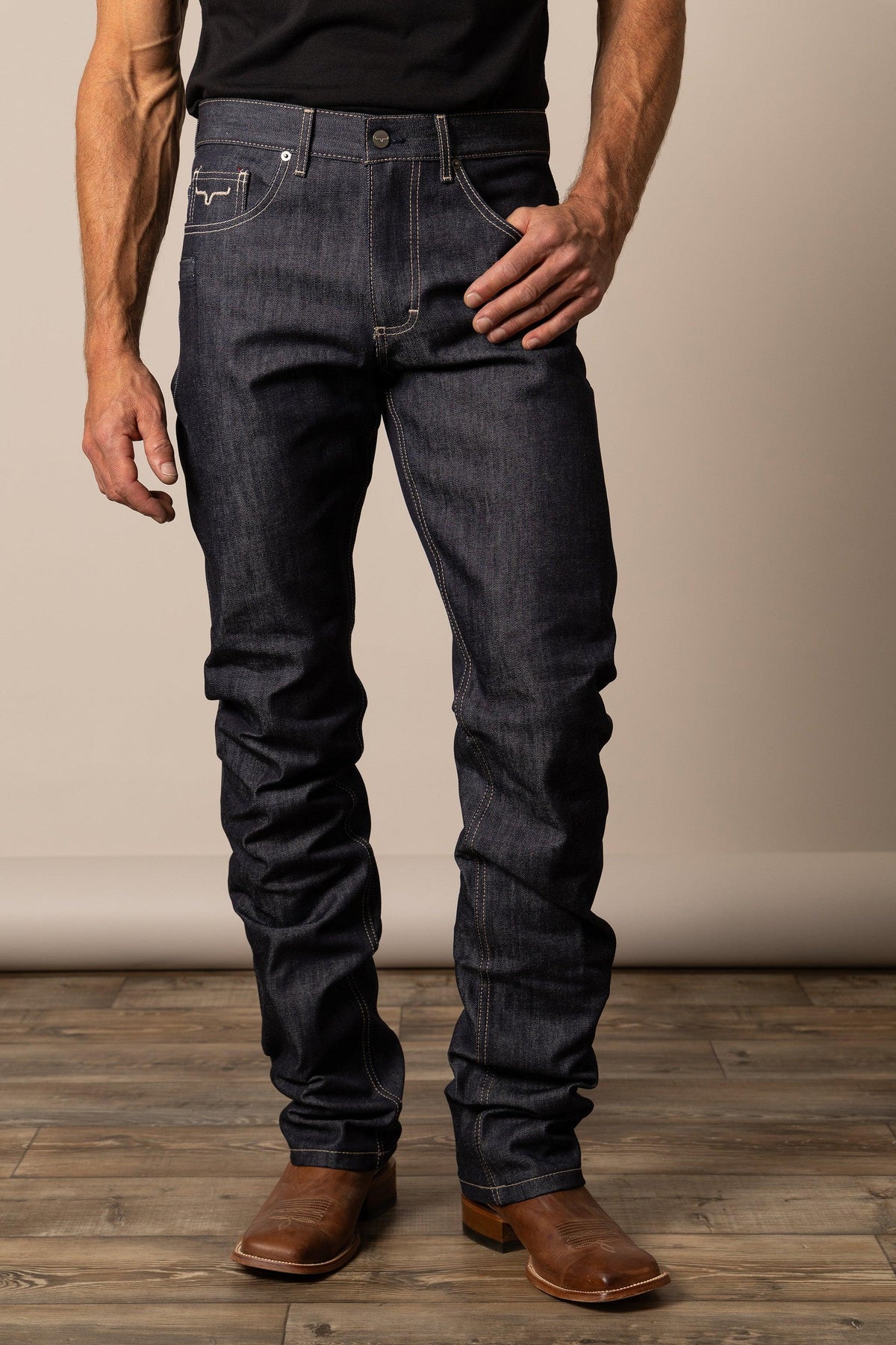 Kimes Ranch Raw James straight fit bootcut jeans in dark indigo with contrast stitching and a logo on the back pocket
