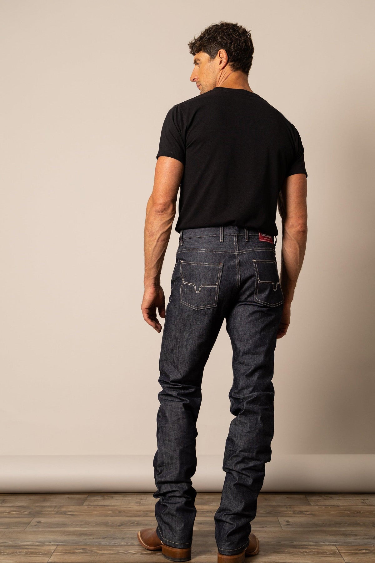 Kimes Ranch Raw James Straight Fit Bootcut jeans in dark indigo with contrast stitching and back pockets