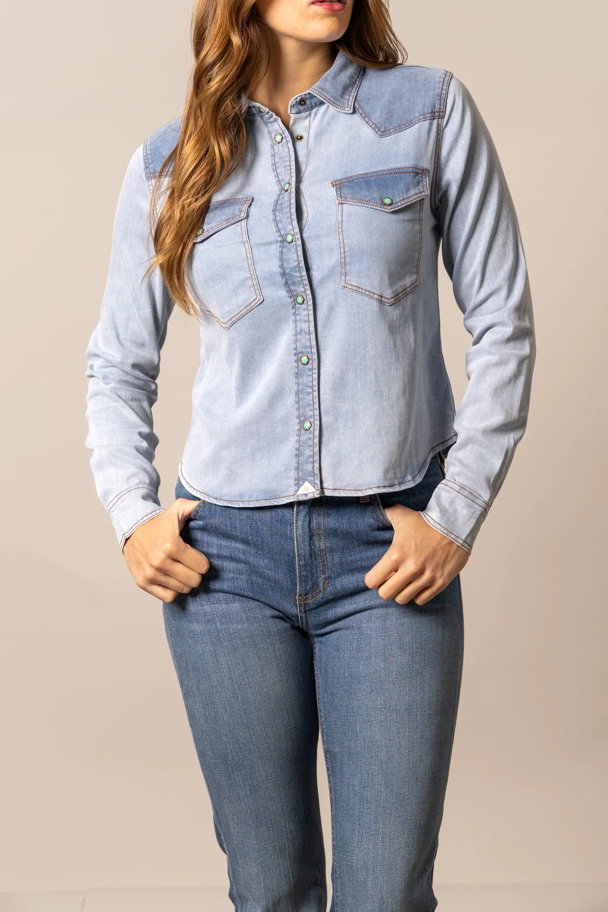 Kimes Ranch Rayna top in Light Wash Indigo with two chest pockets and contrasting stitching