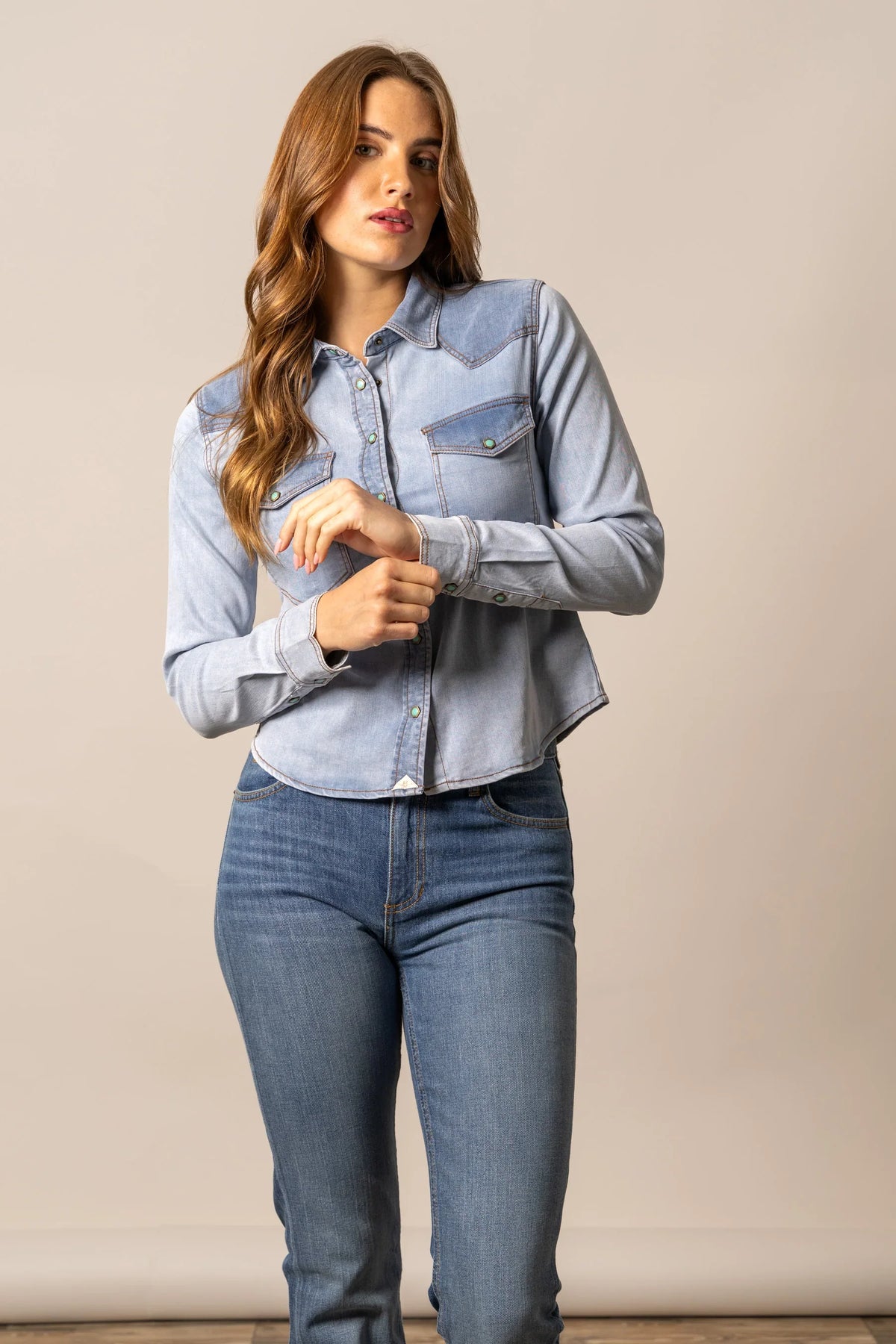 Kimes Ranch Rayna top in Light Wash Indigo with western yoke and button flap pockets