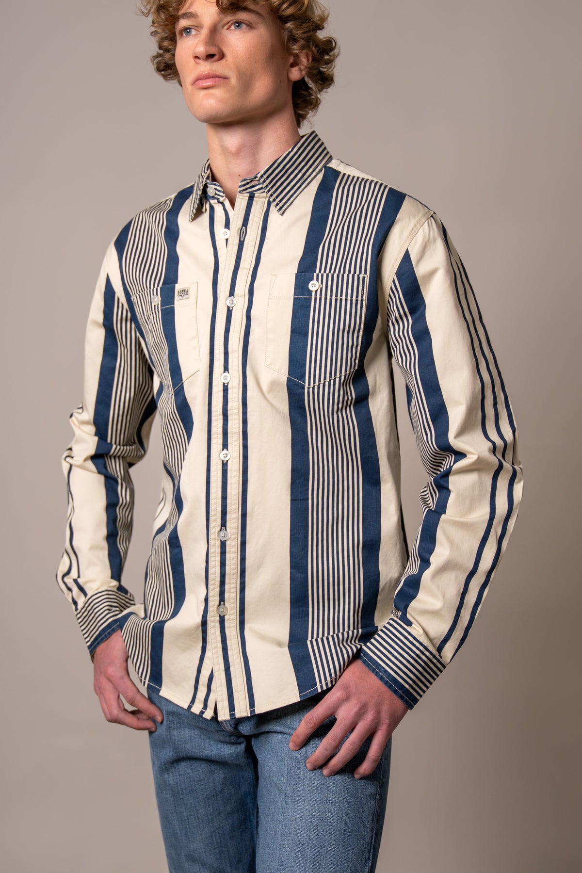 Kimes Ranch Reddy dress shirt in Blue with wide vertical stripes and two chest pockets