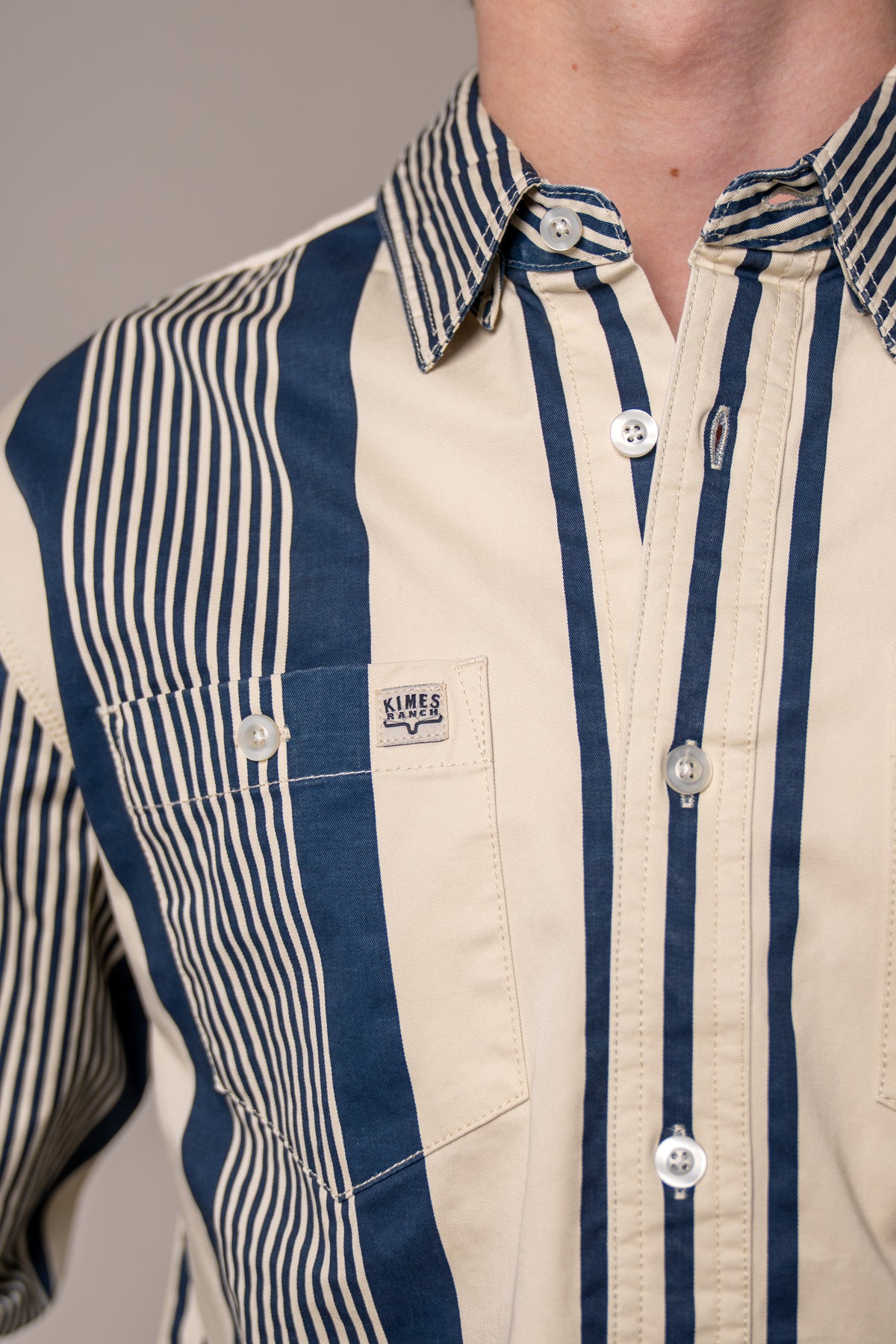 Kimes Ranch Reddy dress shirt in Blue, close-up, with a buttoned chest pocket and contrasting collar