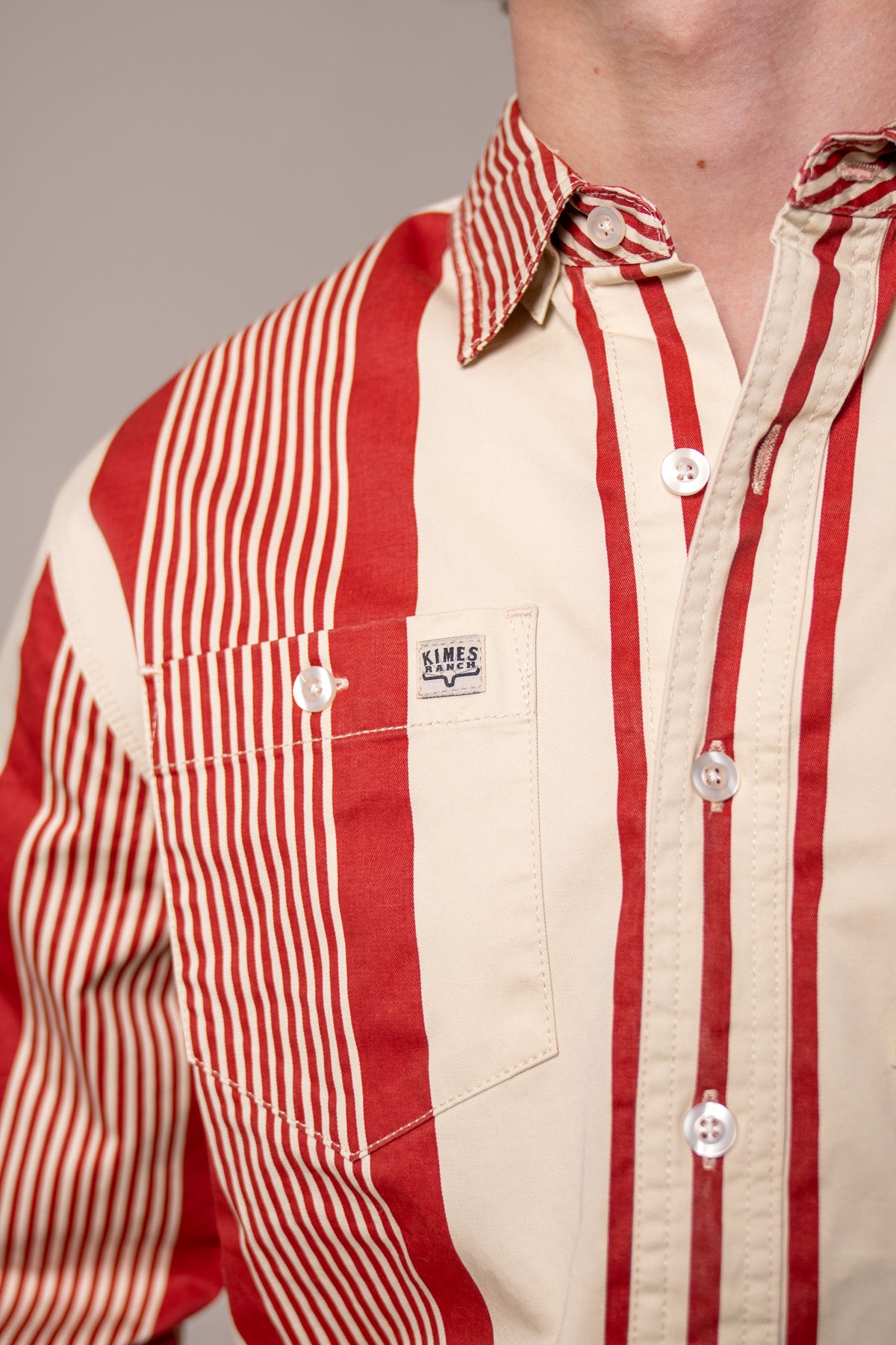 Kimes Ranch Reddy dress shirt in Brick Red, close-up, with a button chest pocket and contrasting collar
