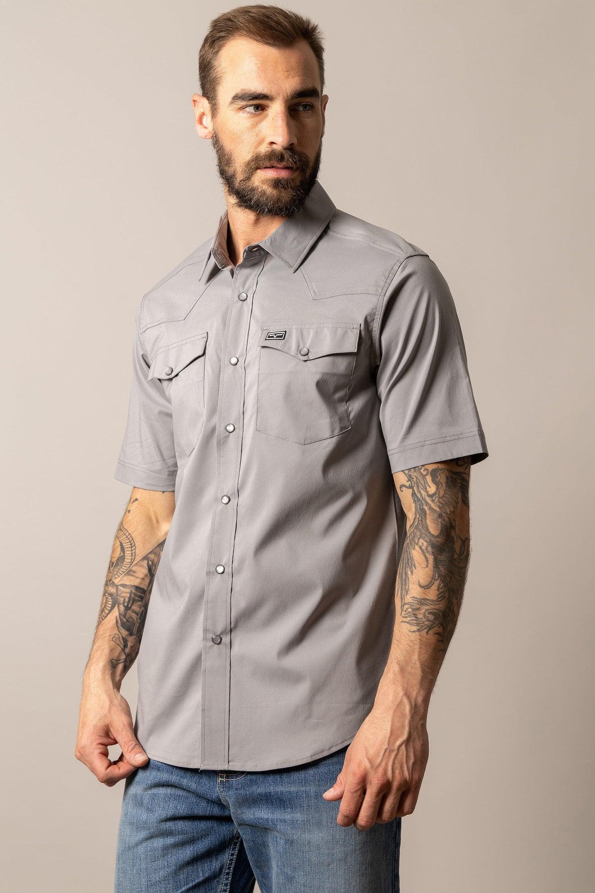 Kimes Ranch Rio Short Sleeve Dress Shirt in Grey with a western yoke and two button flap chest pockets