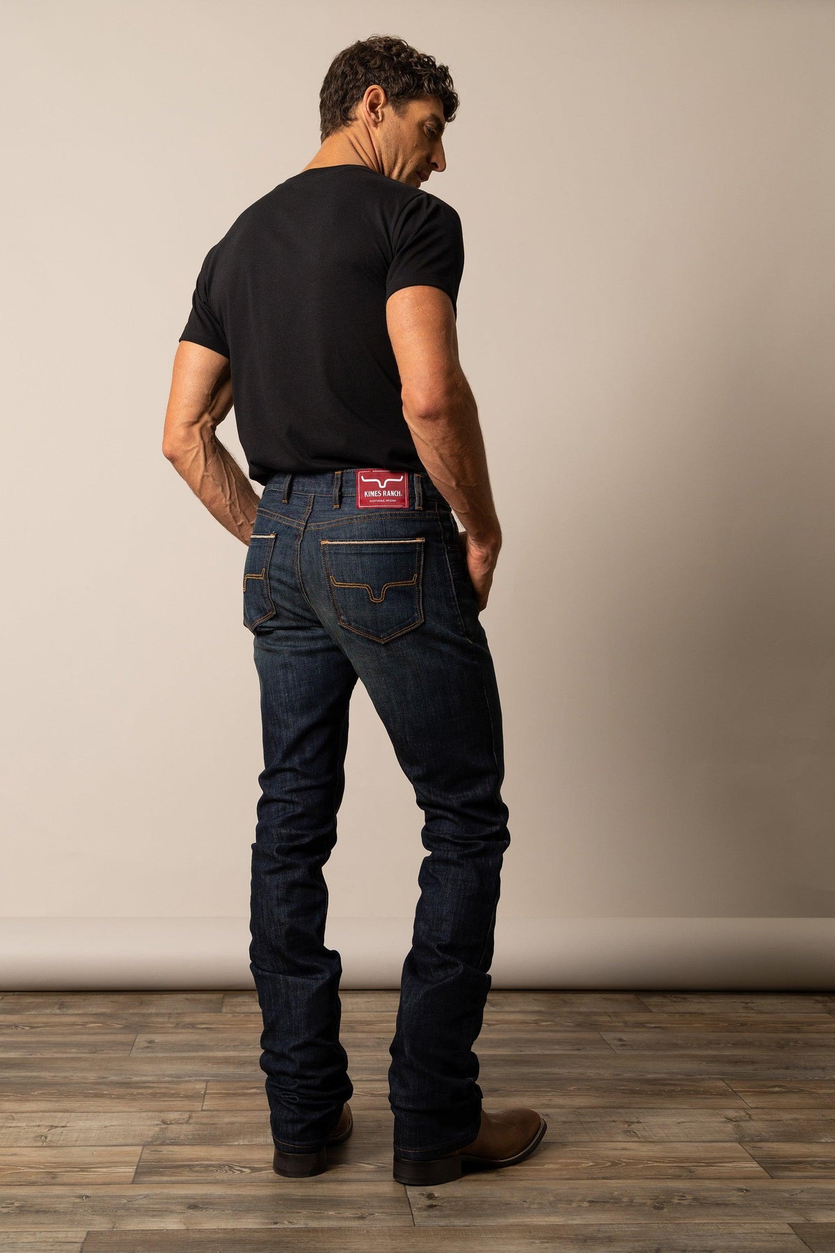Kimes Ranch Roger Modern Bootcut jeans in dark indigo with contrast stitching