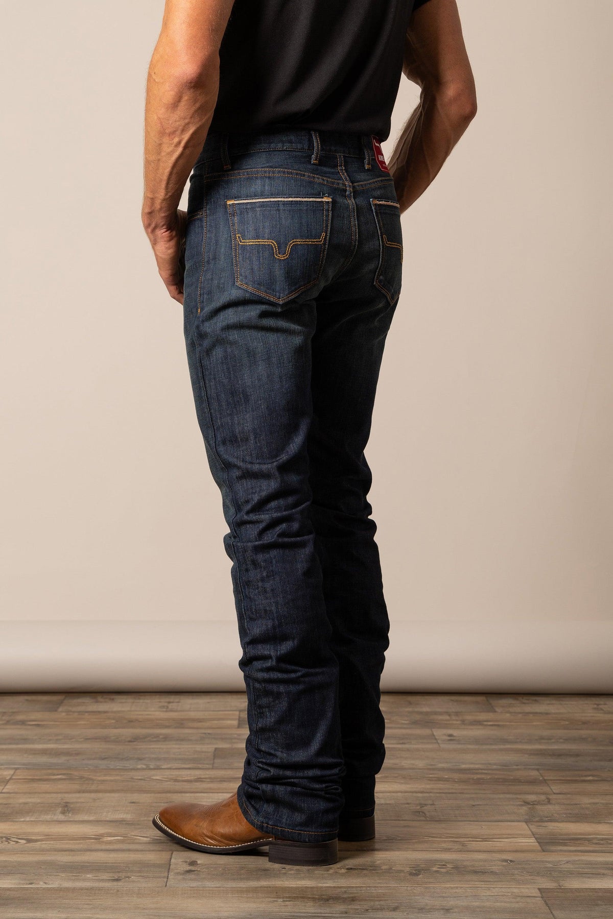 Kimes Ranch Roger Modern Bootcut jeans in dark indigo with signature back pocket stitching and a red brand tab