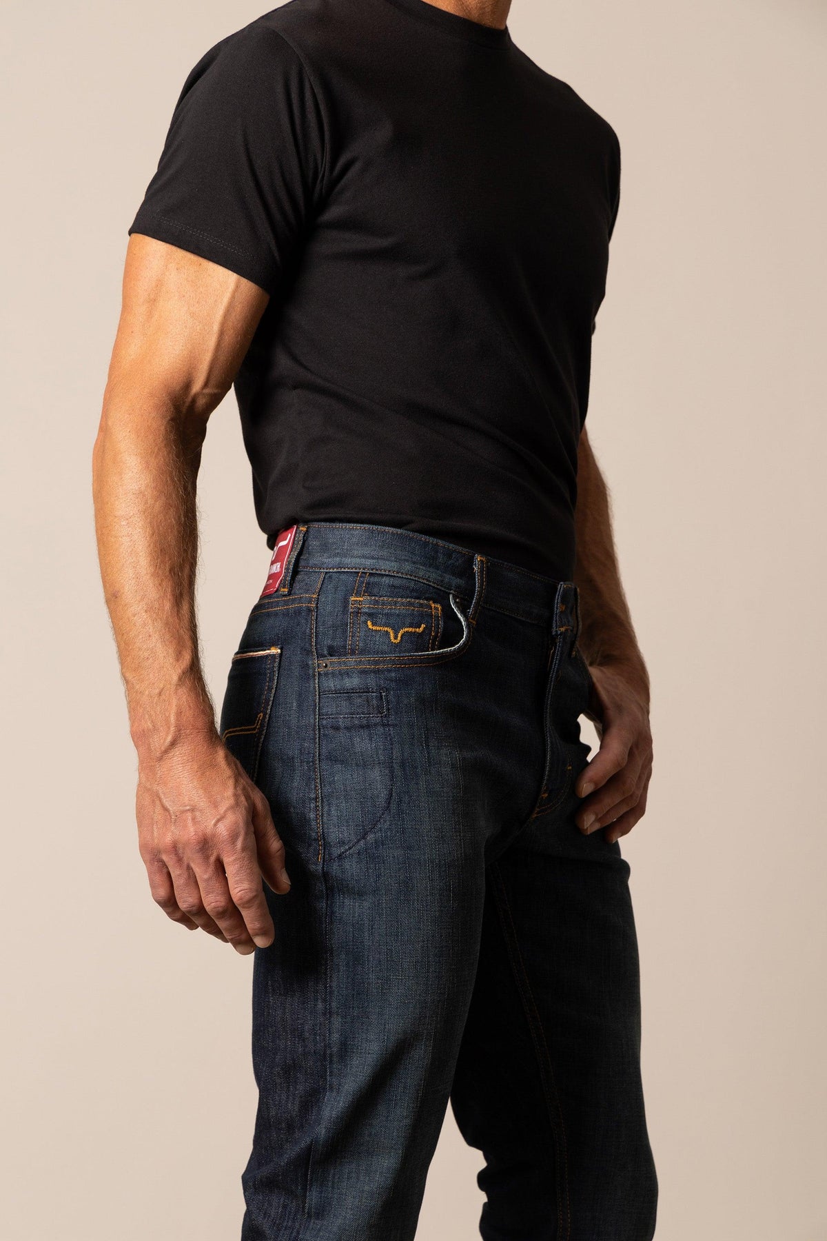 Kimes Ranch Roger Modern Bootcut jeans in dark indigo with embroidered Kimes Ranch logo on back pocket