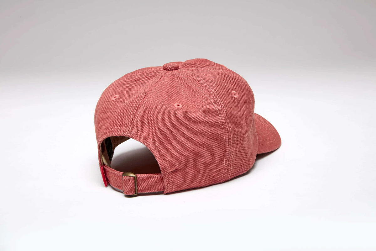 Kimes Ranch Rough Rider hat in Pink, back view, with a button top and adjustable strap