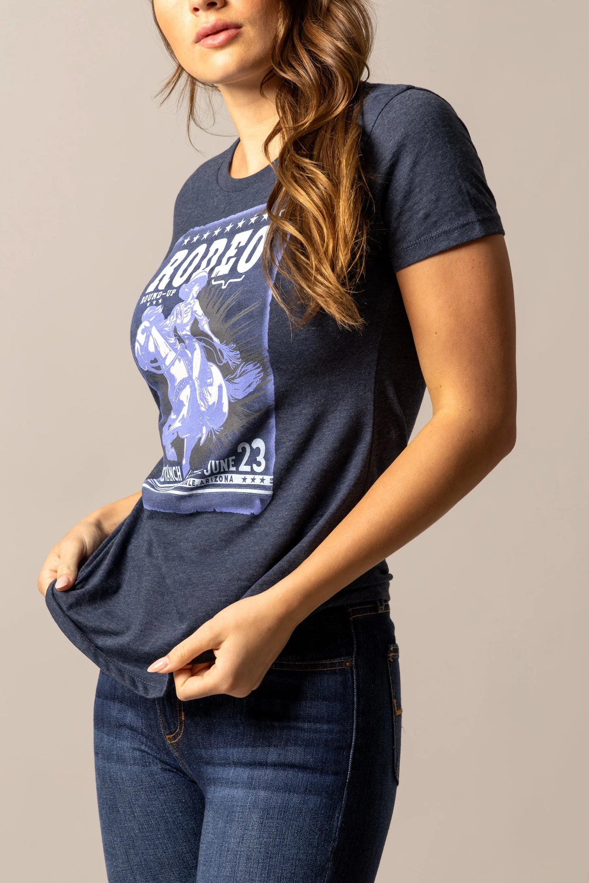 Kimes Ranch Round Up shirt in Midnight Navy, side view, with a graphic of a rodeo scene