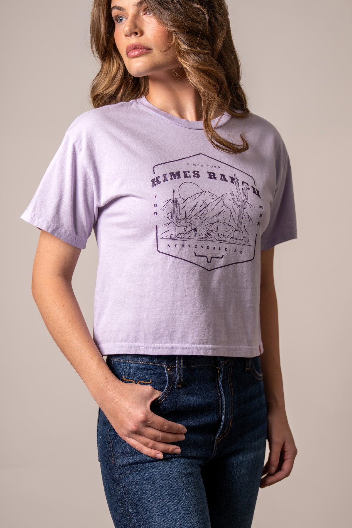 Kimes Ranch See For Miles shirt in Lavender with a desert scene graphic and Scottsdale AZ text
