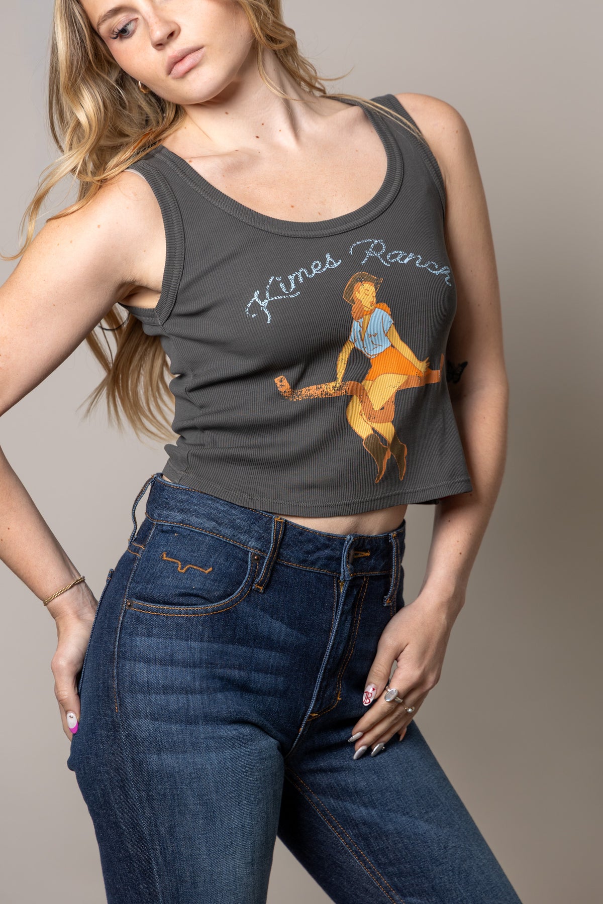 Kimes Ranch See Saw Black ribbed tank top with a vintage graphic of a girl on a seesaw and "Kimes Ranch" text