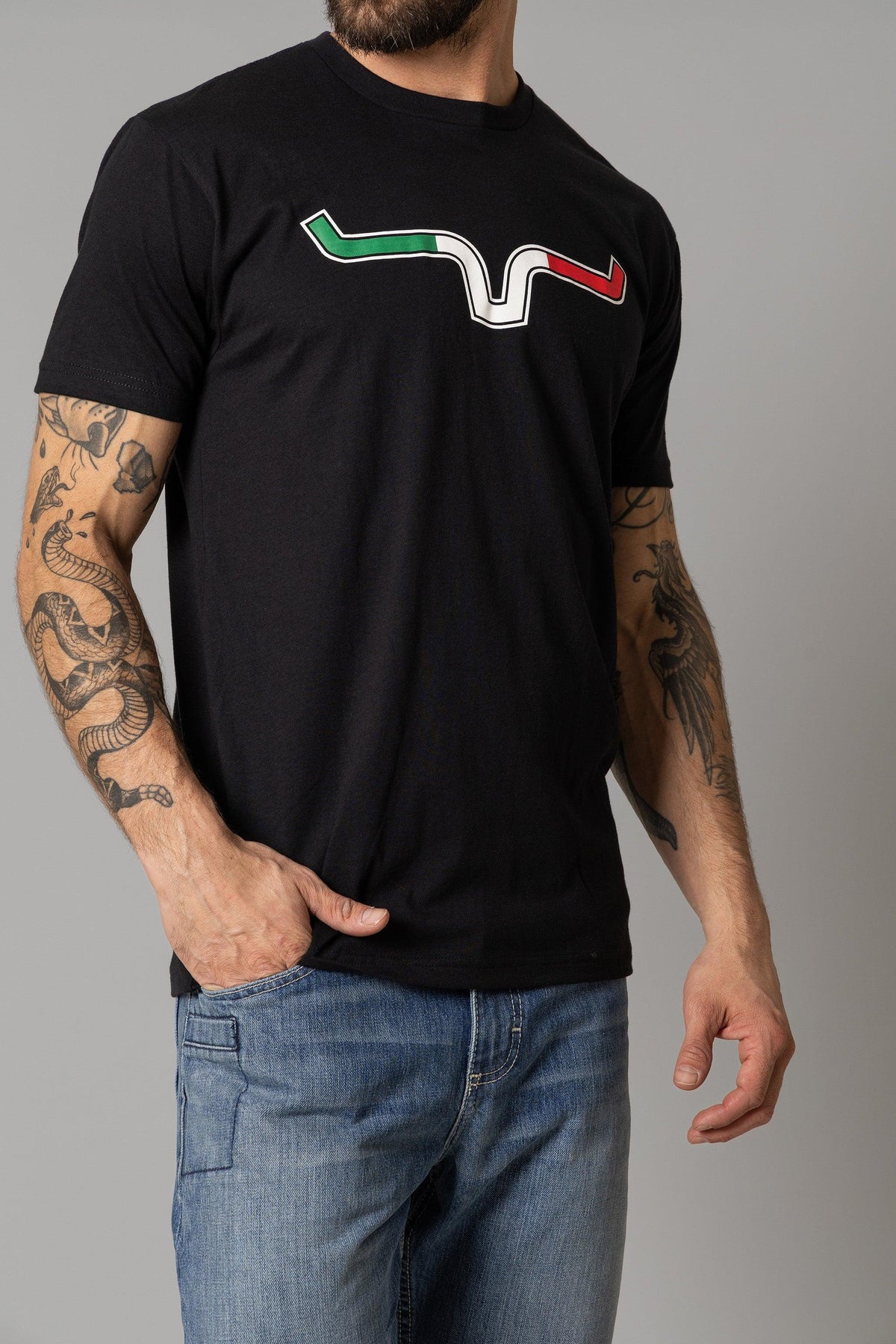 Kimes Ranch Semana Shirt in Black with a stylized steer logo in green, white, and red
