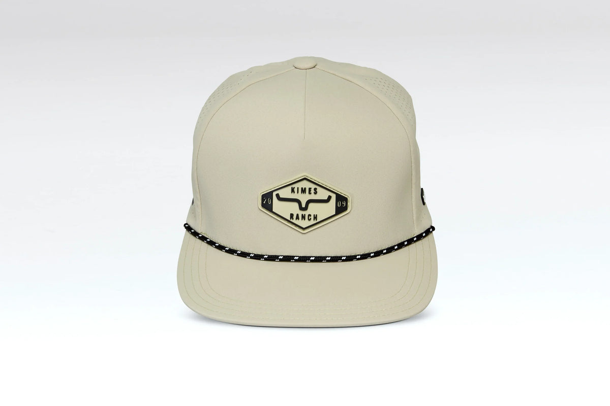 Kimes Ranch Serrano Trucker hat in Straw with a front logo patch and black and white braided trim