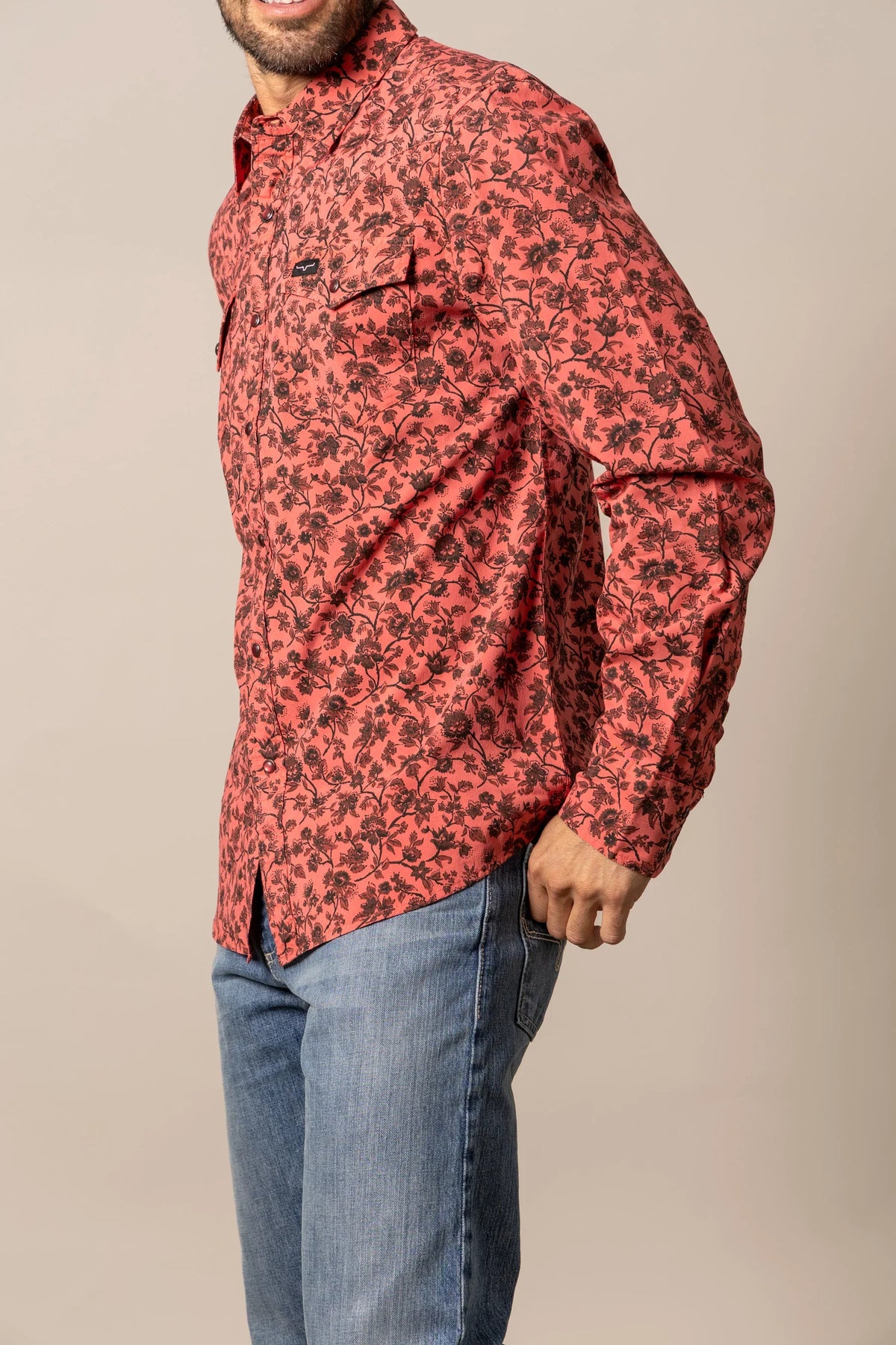 Kimes Ranch Show Vines dress shirt in Red, side view, with a black floral print and chest pockets