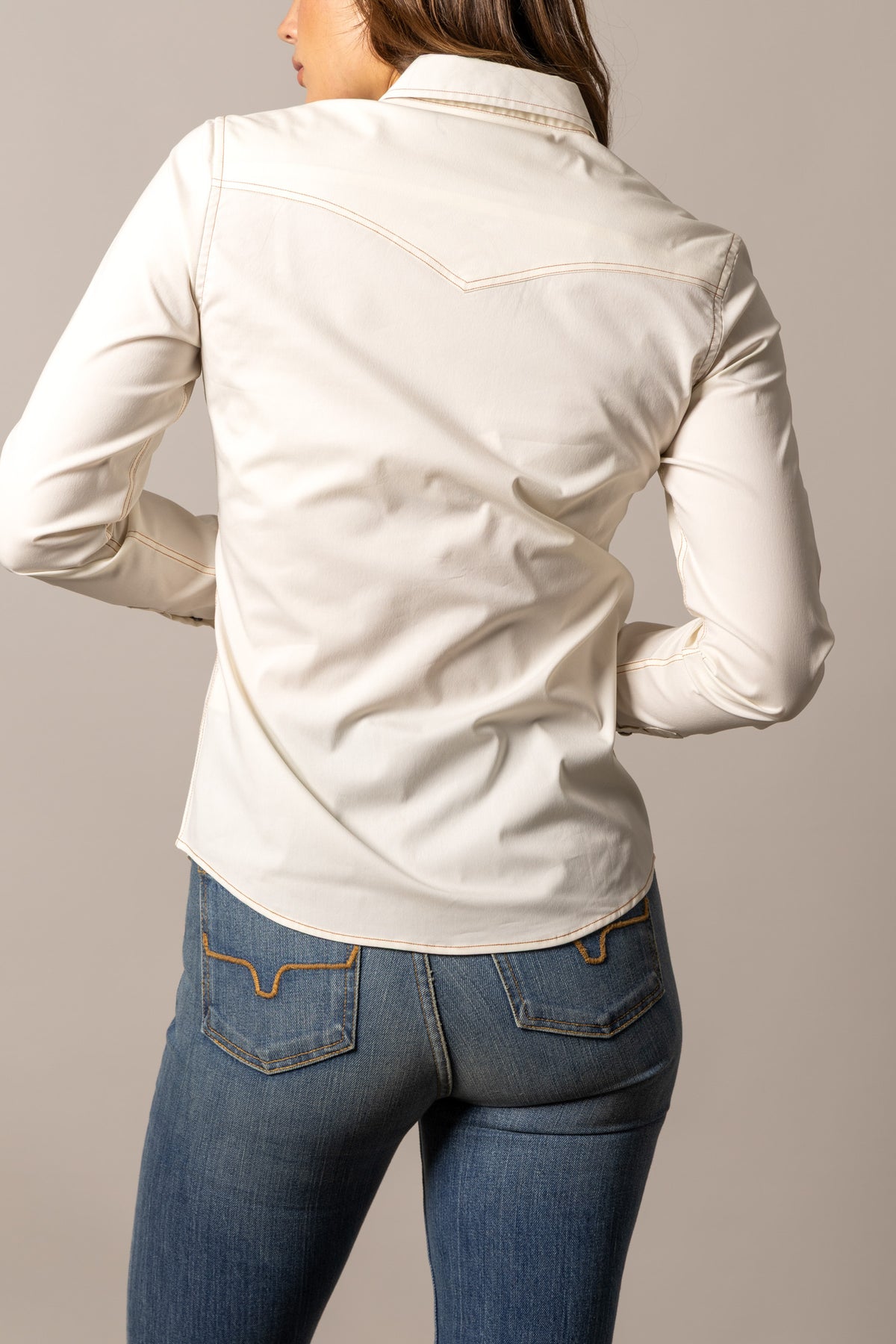 Kimes Ranch Skeeter top in Pristine, back view, with long sleeves and contrast stitching on the back yoke