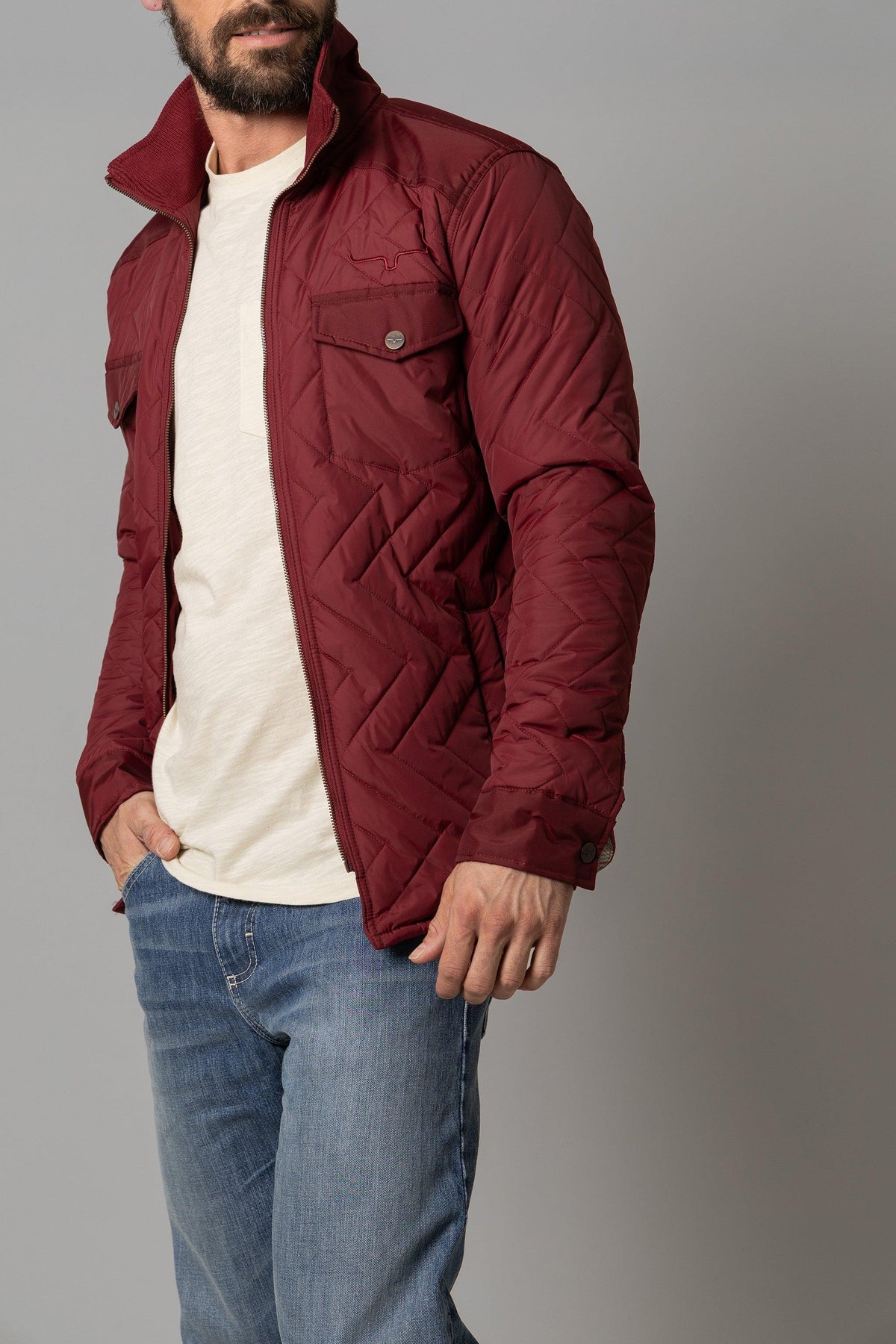 Kimes Ranch Skink Jacket in Burgundy, side view, with chevron quilting and front flap pockets