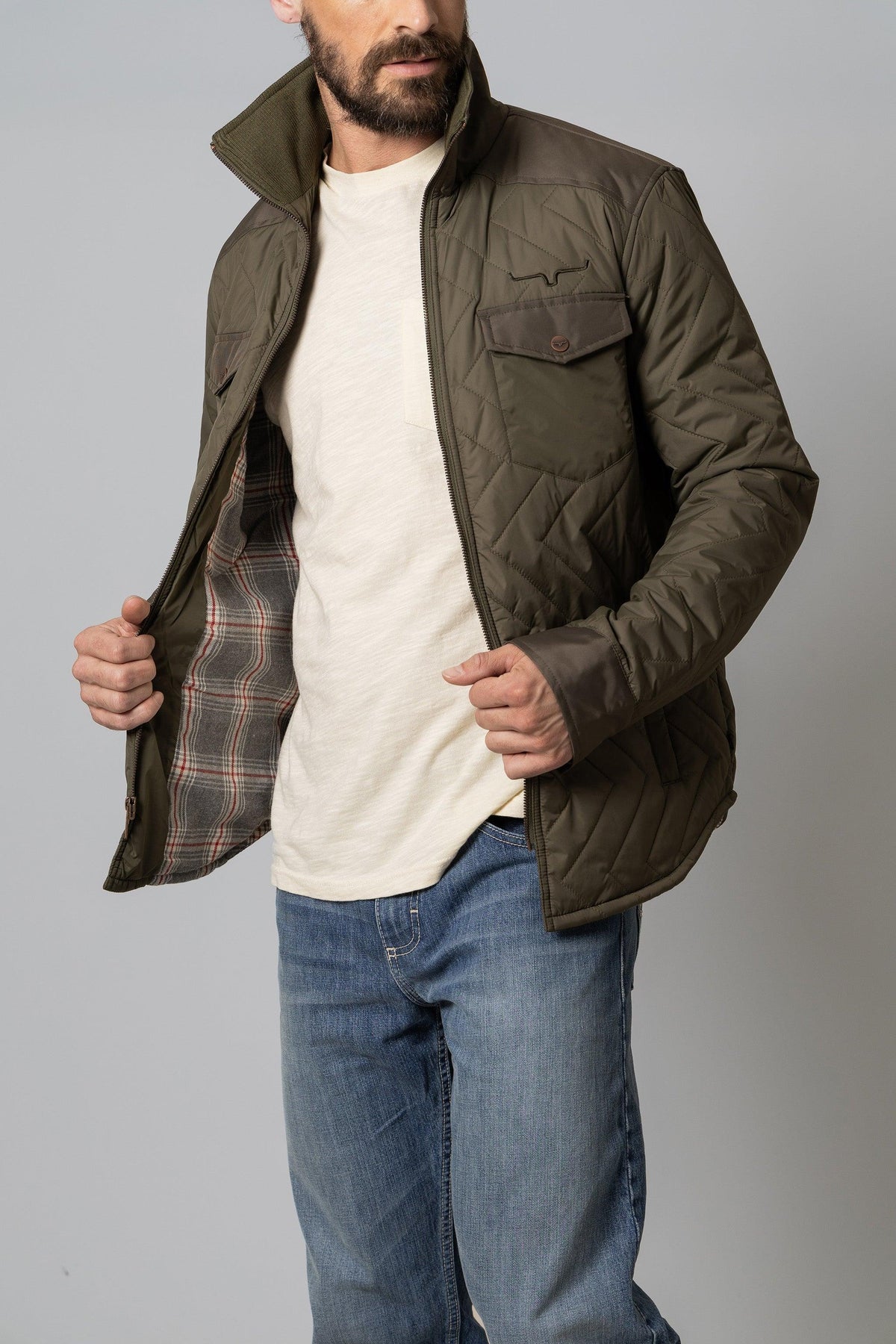 Kimes Ranch Skink Jacket in Military Green with quilted diamond pattern and plaid lining